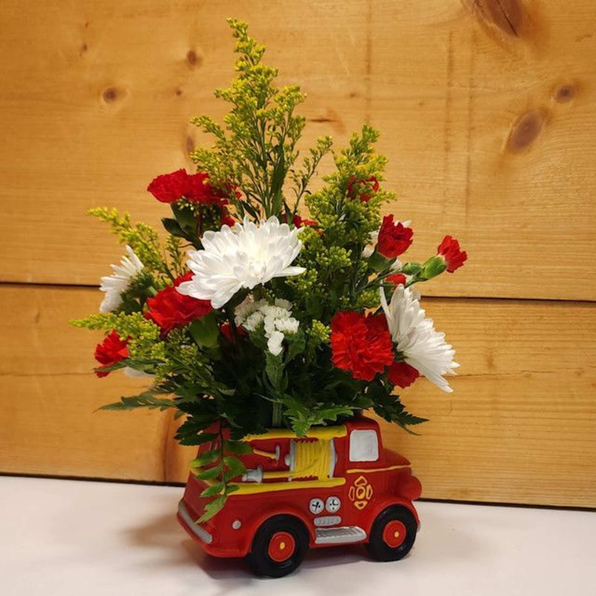 Celebrate the arrival of a little one with this charming floral arrangement Celebrate the arrival of a little one with this charming floral arrangement