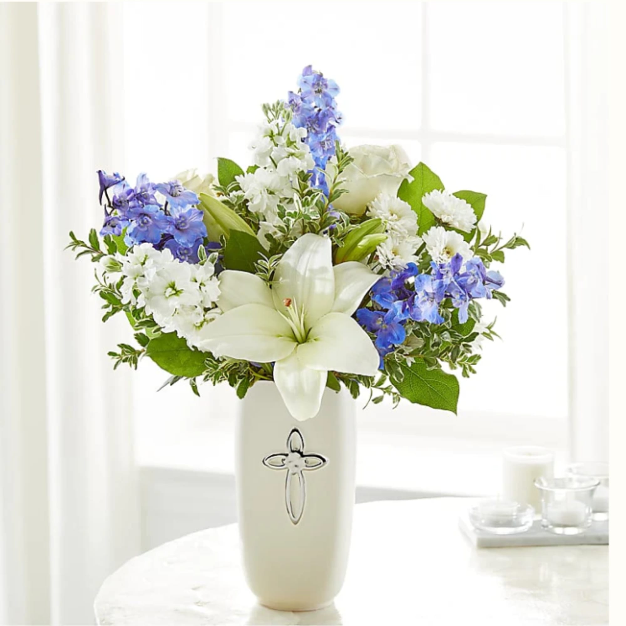 Heavenly blossoms indeed, this bouquet makes a beautiful gift to offer condolences