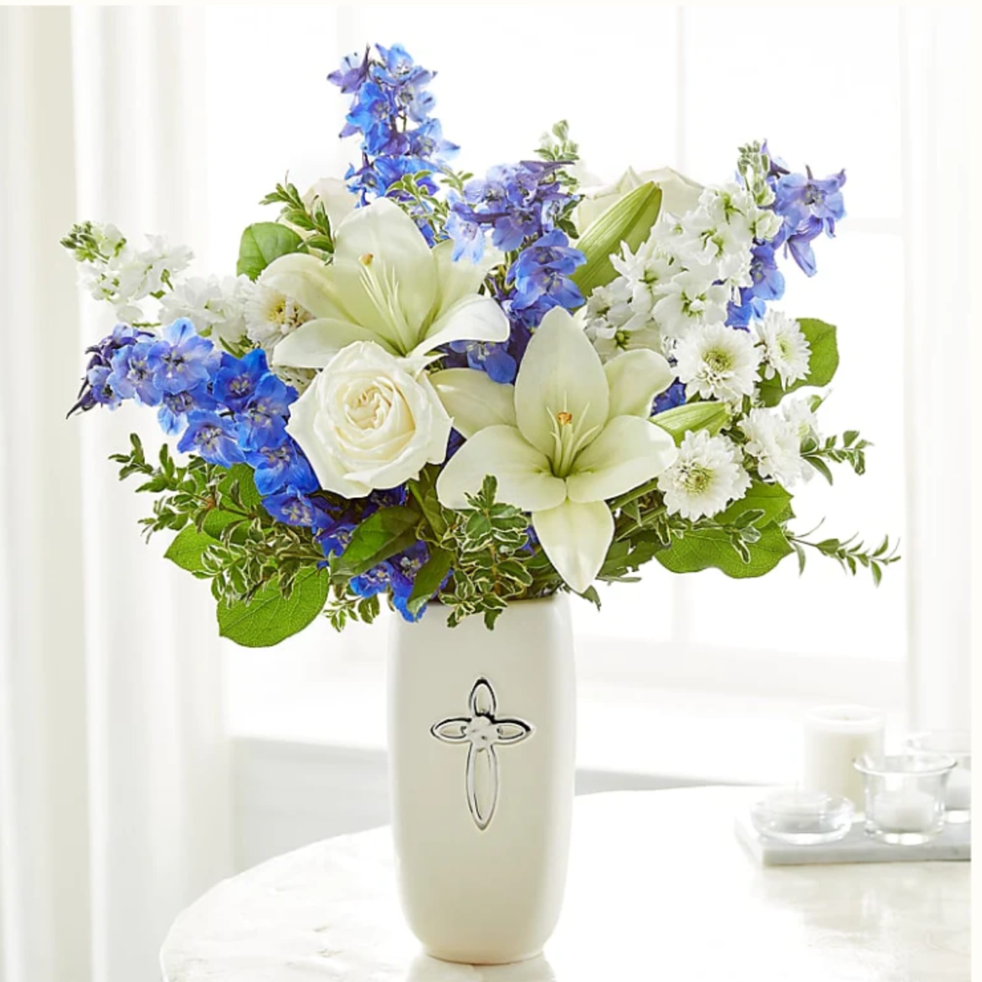 Heavenly blossoms indeed, this bouquet makes a beautiful gift to offer condolences