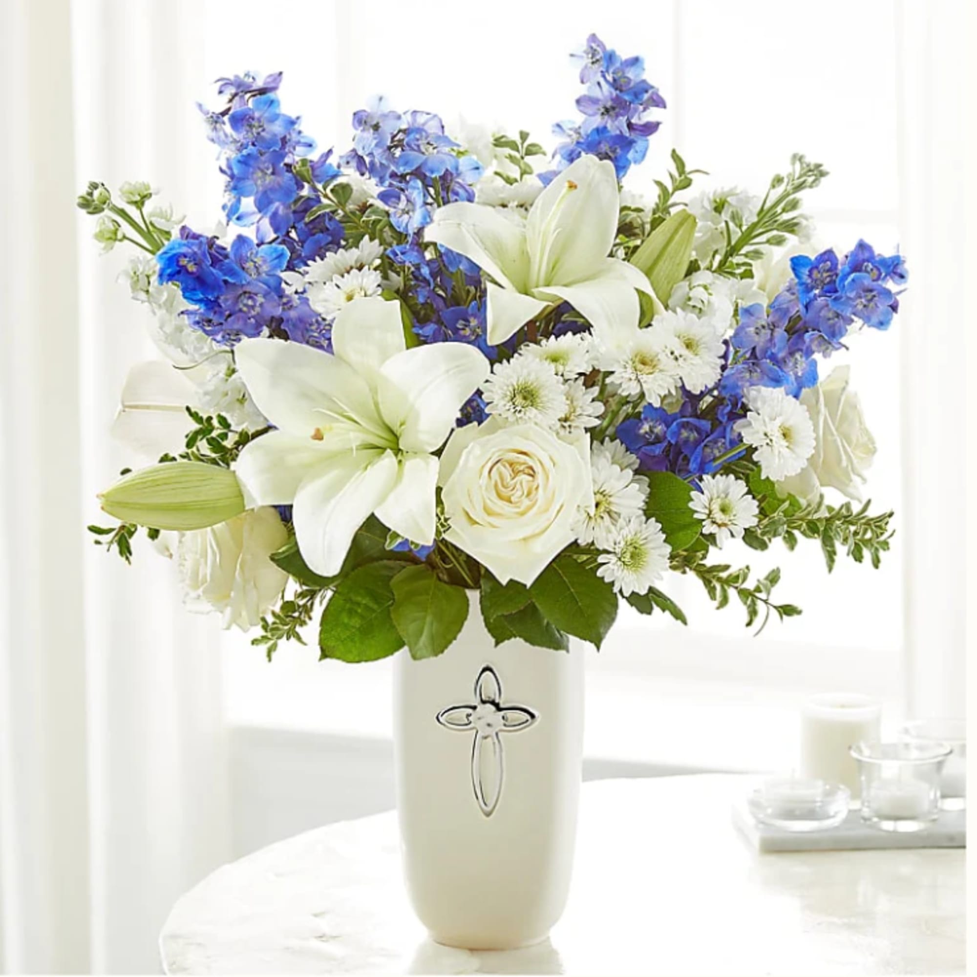 Heavenly blossoms indeed, this bouquet makes a beautiful gift to offer condolences