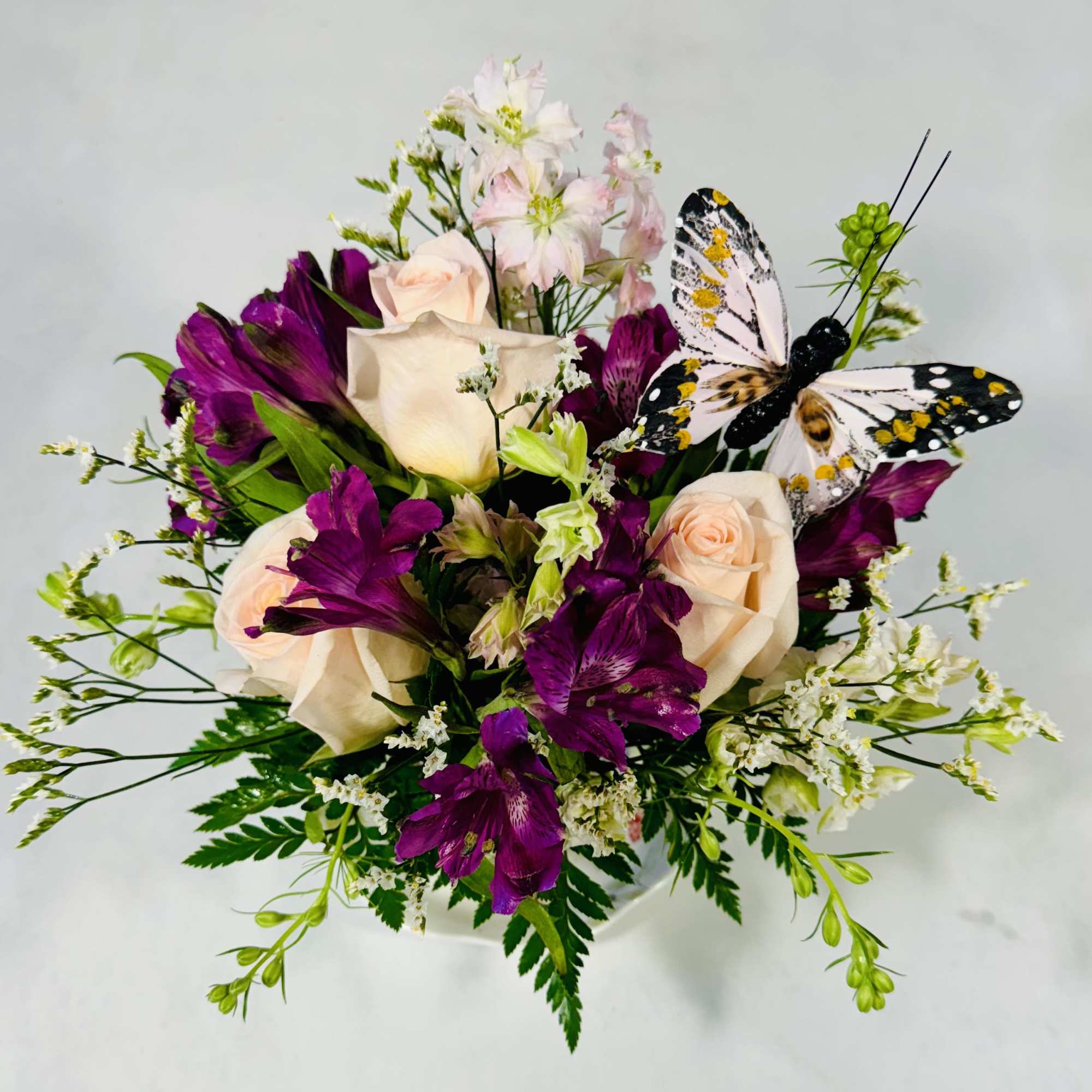 This lovely floral gift offers fresh flowers in a charming ceramic teacup This lovely floral gift offers fresh flowers in a charming ceramic teacup