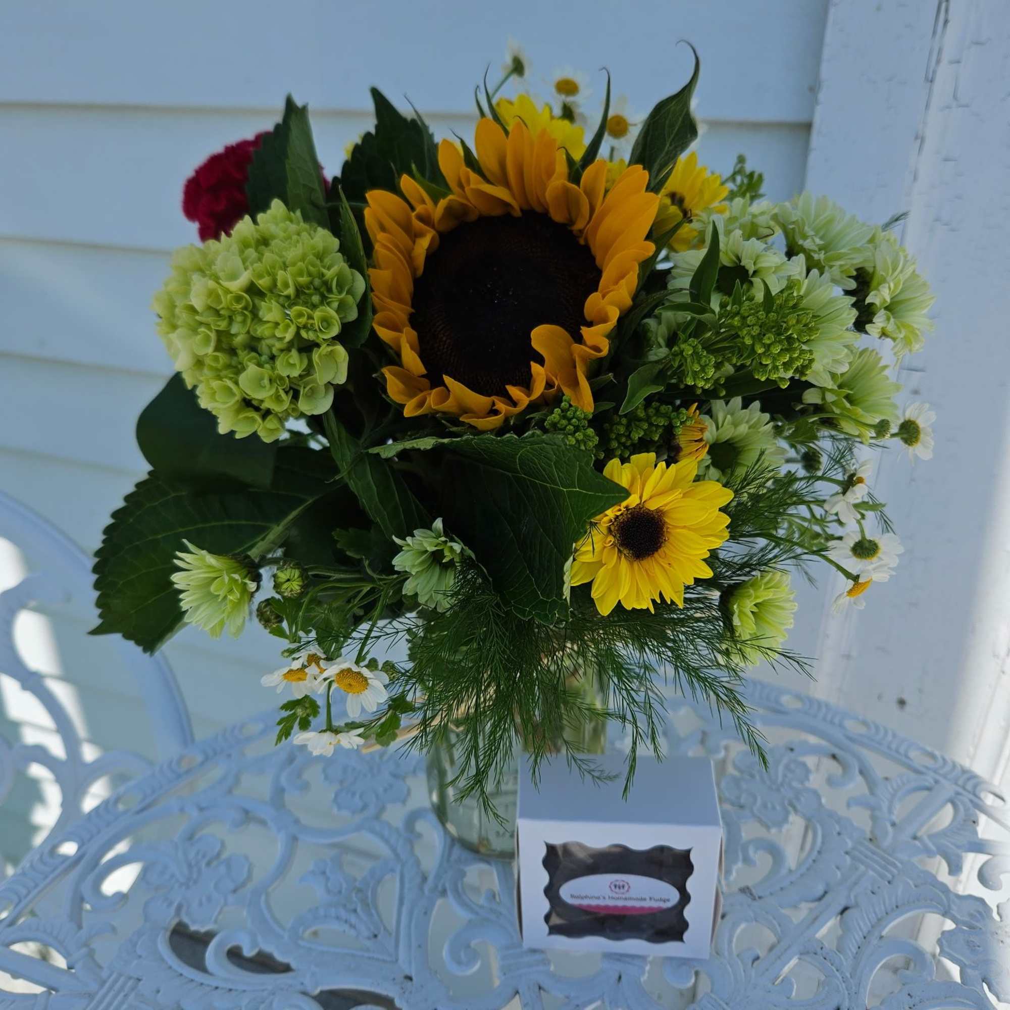 Sunflowers, Hydrangea, daisies, garden flowers arranged in a mason jar with Ralphina&#039;s