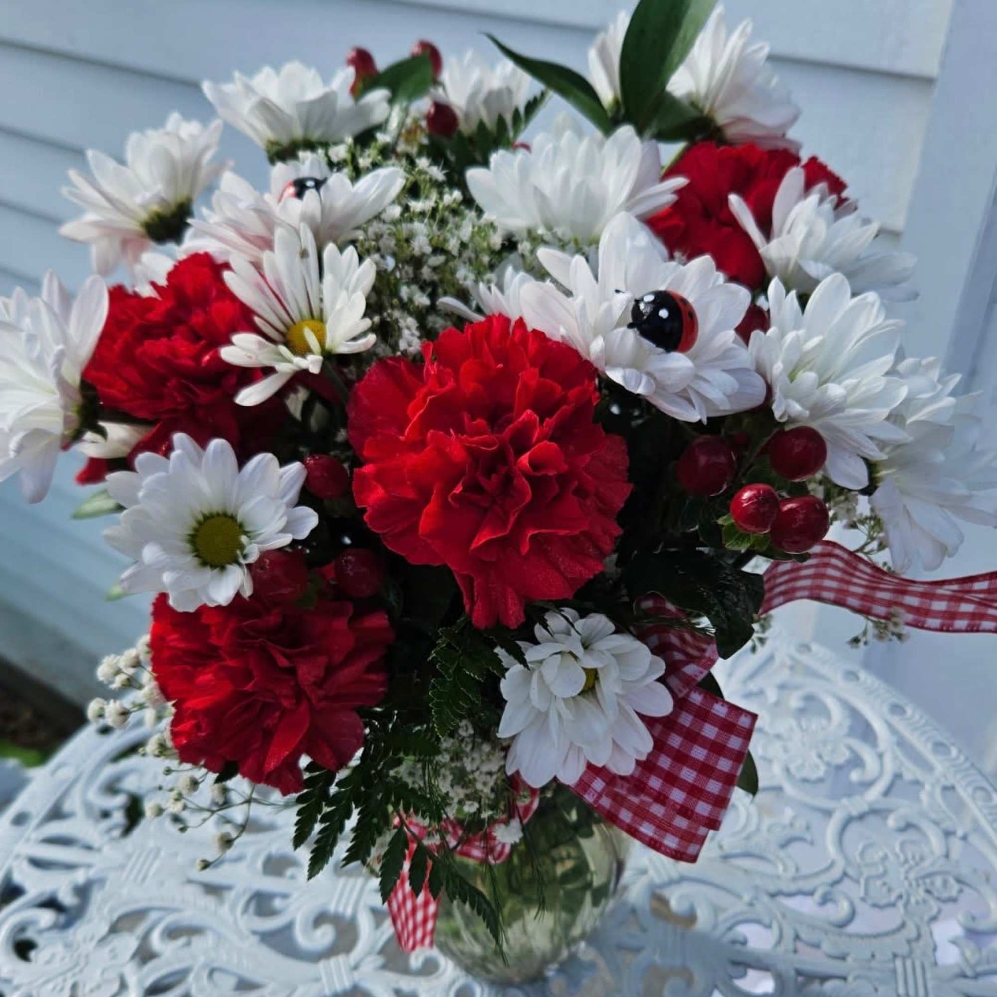 Reds and whites with faux lady bugs and red gingham ribbon Reds and whites with faux lady bugs and red gingham ribbon