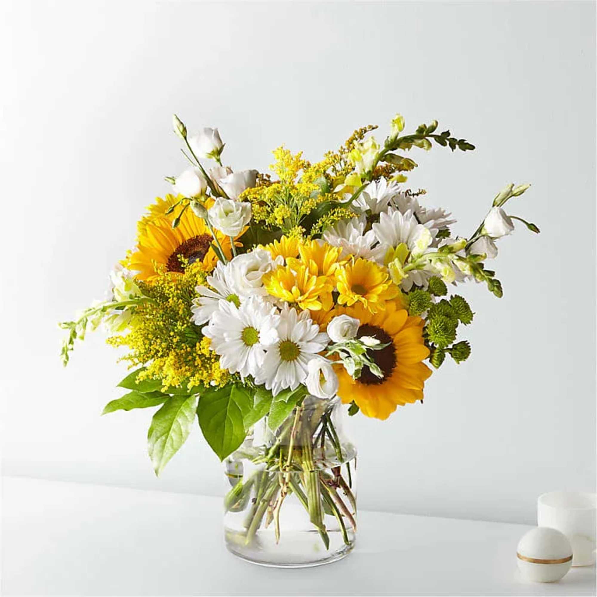 Give a dose of sunshine in bloom. This stunning bouquet is teeming