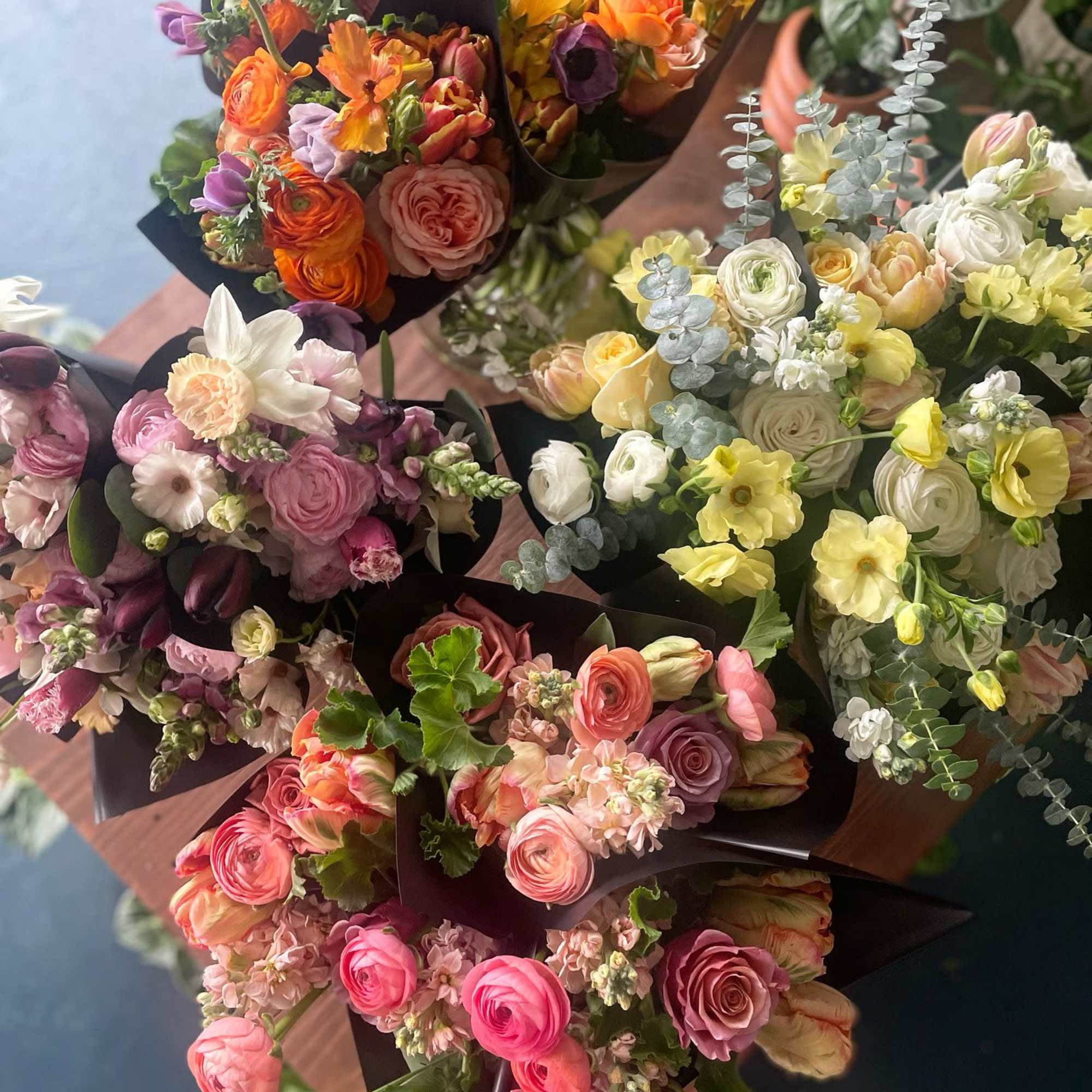 Embrace the beauty of nature with our Designer&rsquo;s Choice Loose Wrap Arrangements