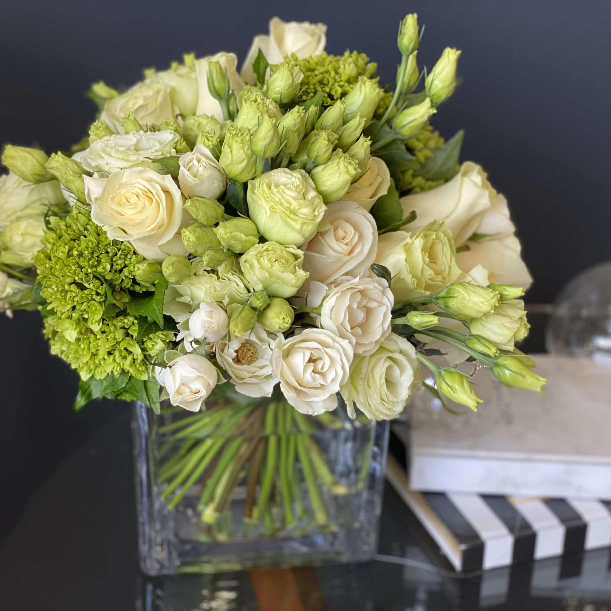 Perfect mix of white roses, spray roses, green hydrangeas and lisianthus 