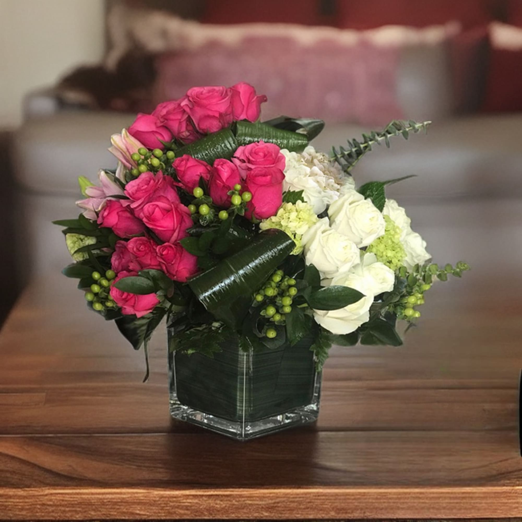 Introducing the Enchanted Bloomsquare, a mesmerizing square clear vase filled with delicate Introducing the Enchanted Bloomsquare, a mesmerizing square clear vase filled with delicate