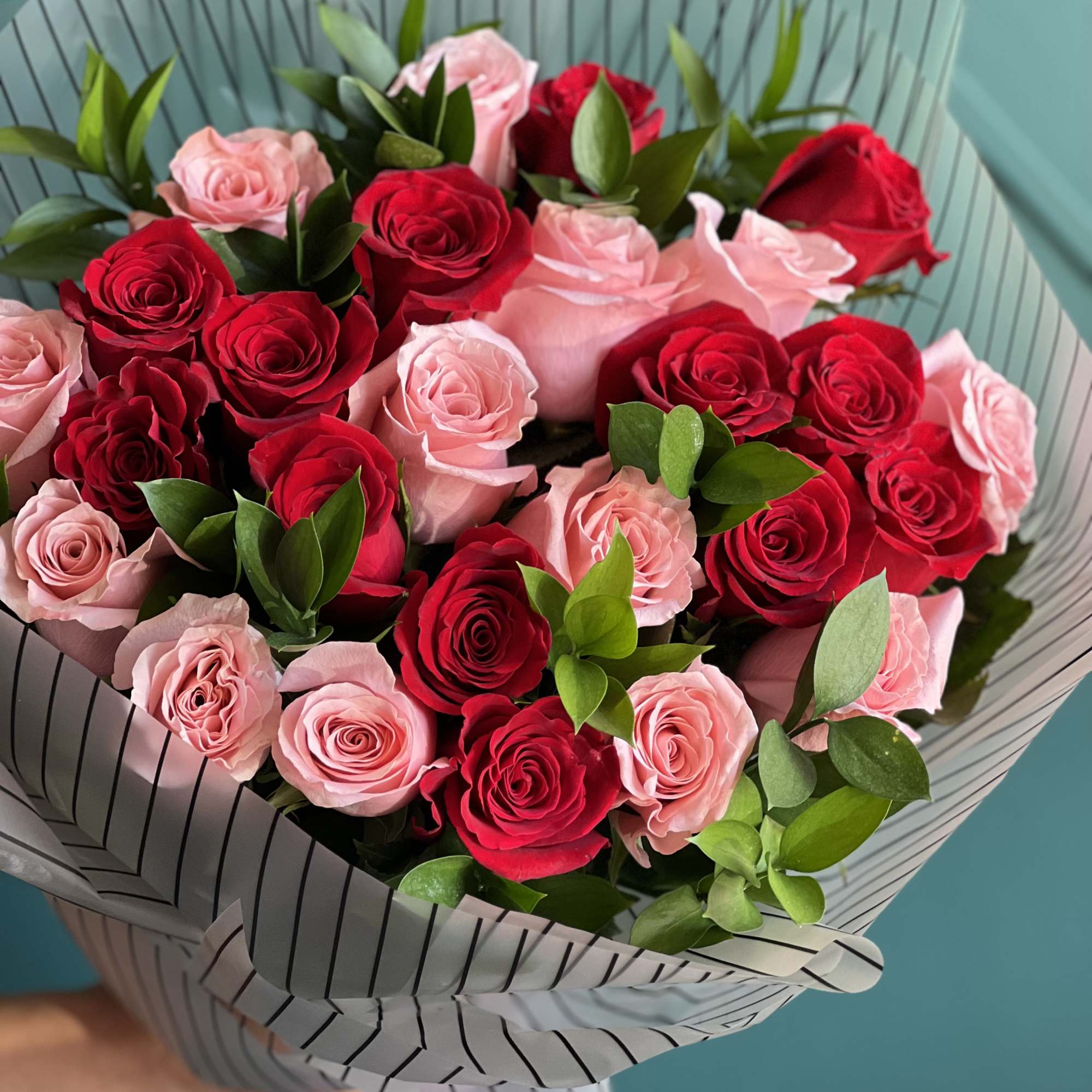2 Dozen red and pink roses bouquet . Vase not included 