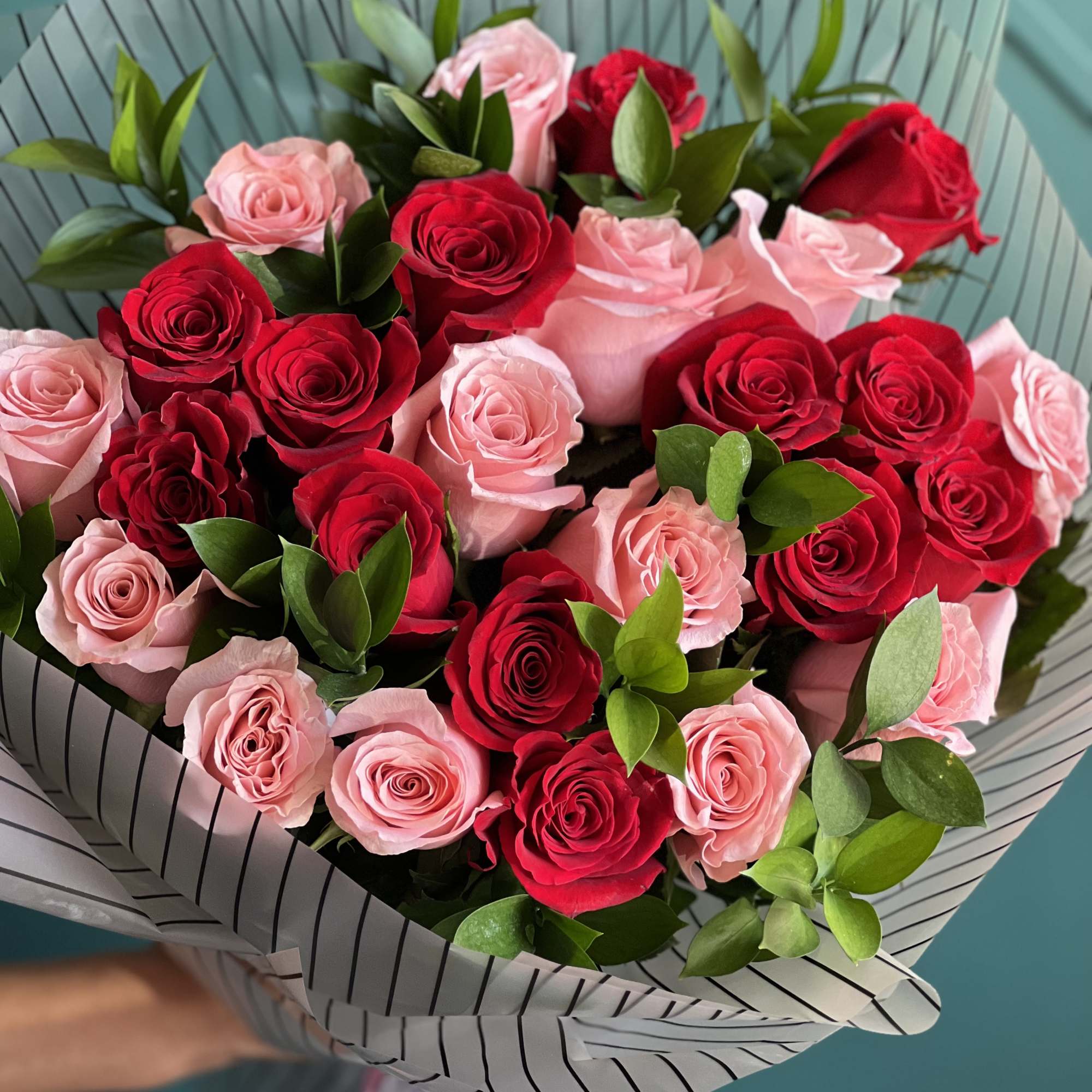 2 Dozen red and pink roses bouquet . Vase not included 
