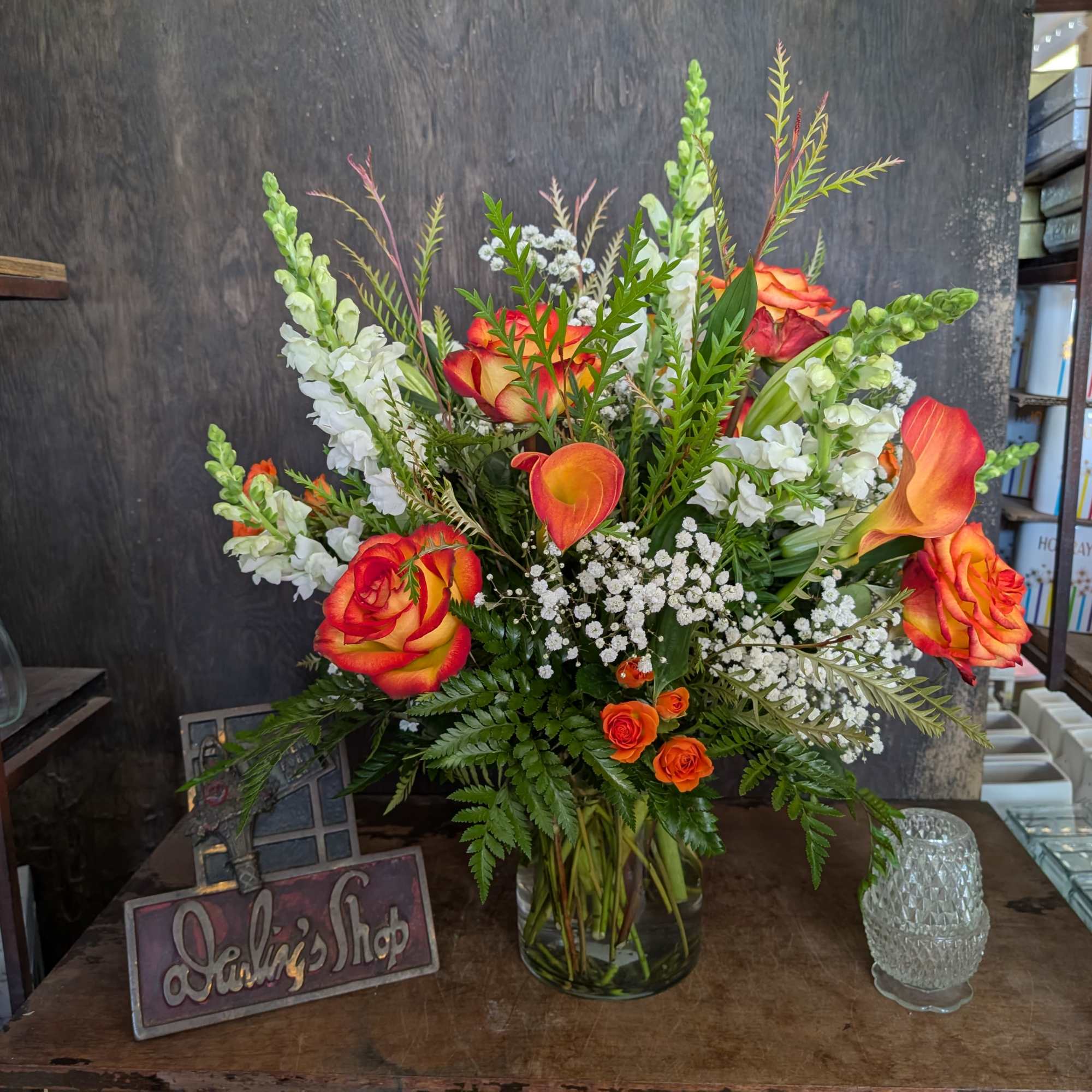 Simple yet elegant display for any occasion. Callas, spray roses, lily .....