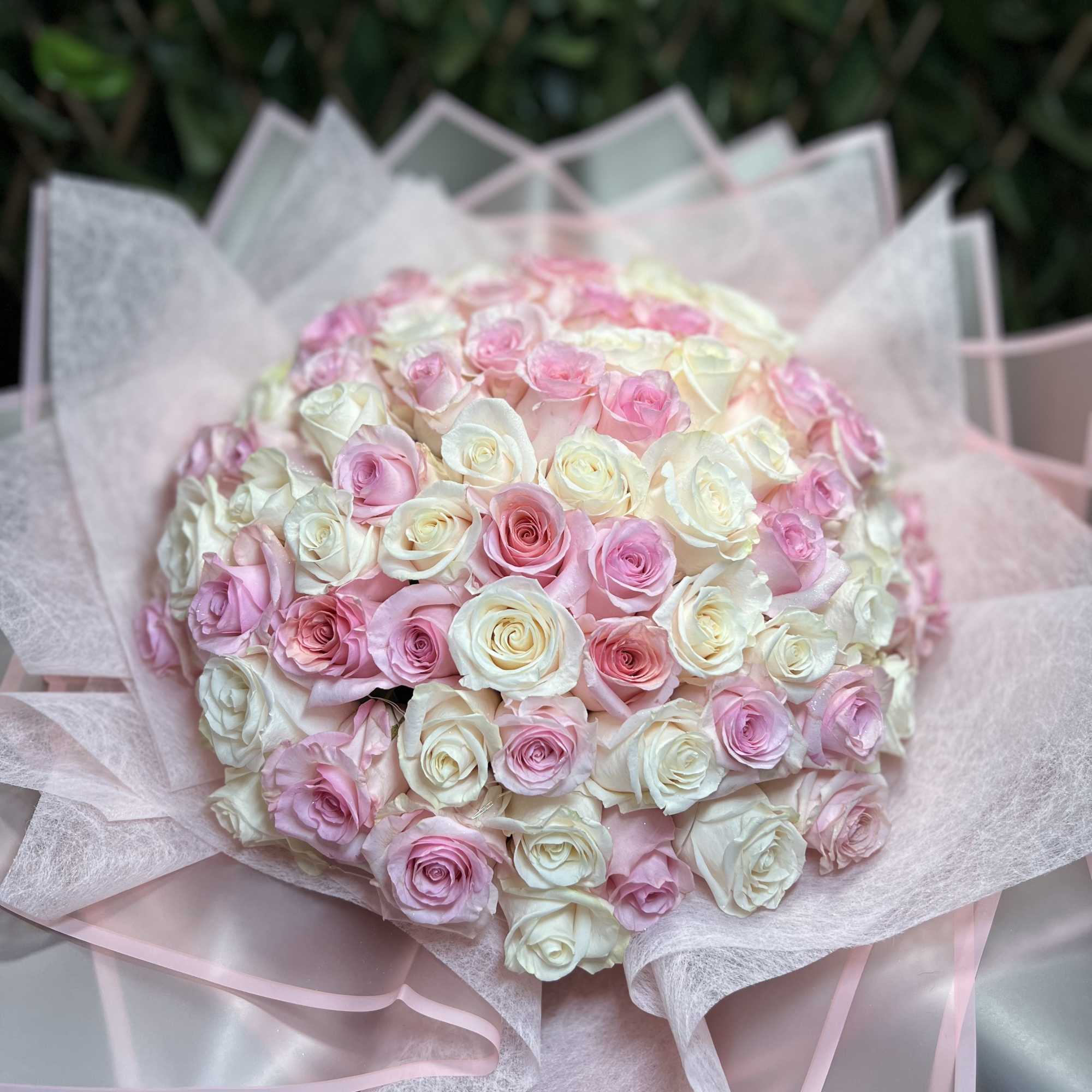 Luxury pale pink and creamy white roses bouquet wrapped with elegant Korean