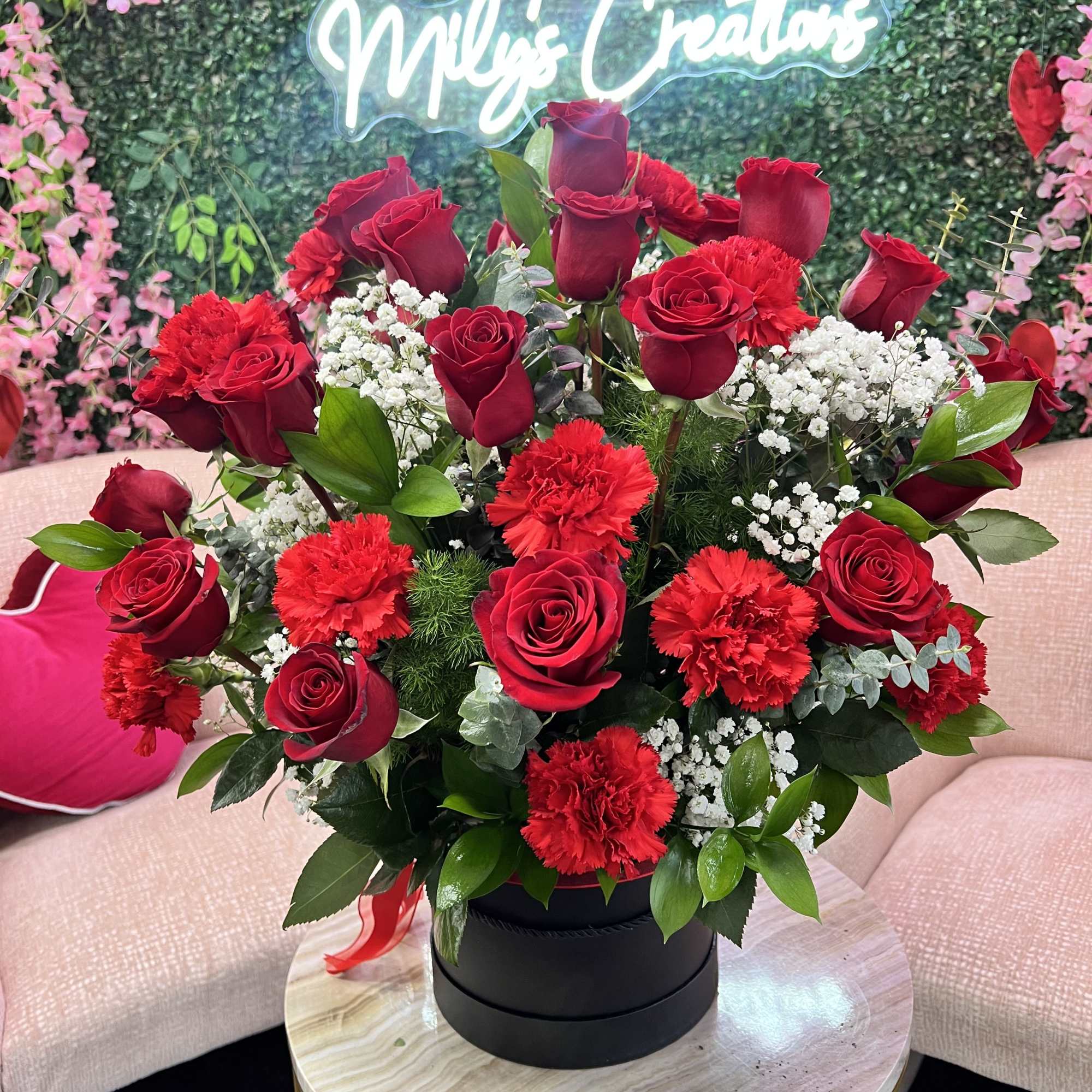 Immerse yourself in the intoxicating beauty of the arrangement, where deep red Immerse yourself in the intoxicating beauty of the arrangement, where deep red