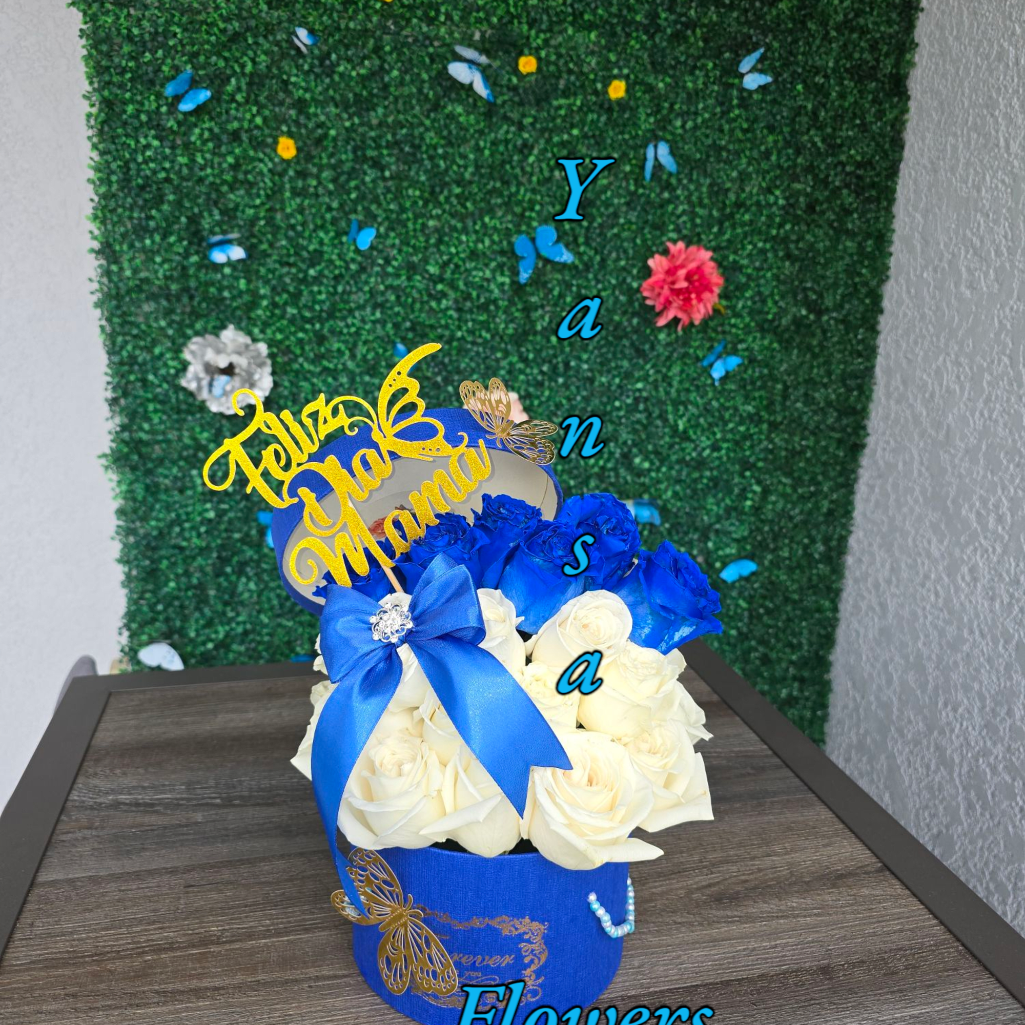  White &amp; Blue Mixed Floral Arrangement in Round Box 
Fresh, elegant