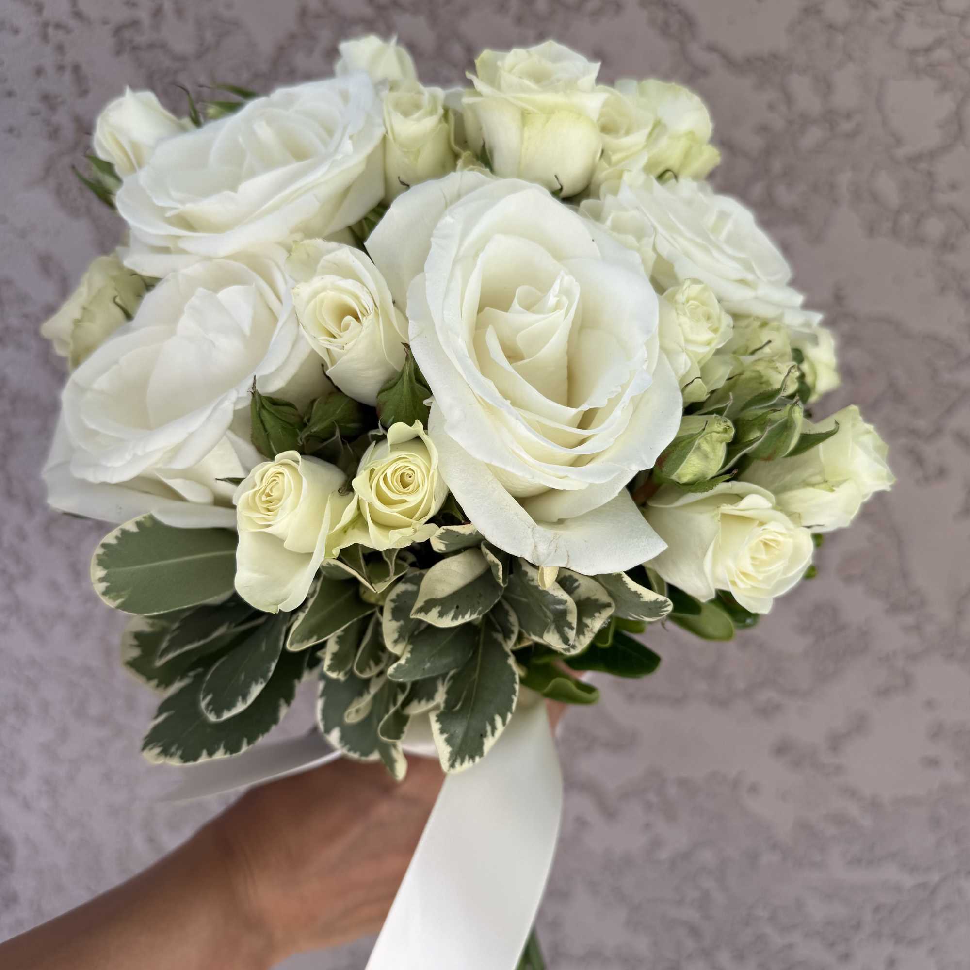 Walk down the aisle with timeless beauty in hand. Our Elegant White Walk down the aisle with timeless beauty in hand. Our Elegant White