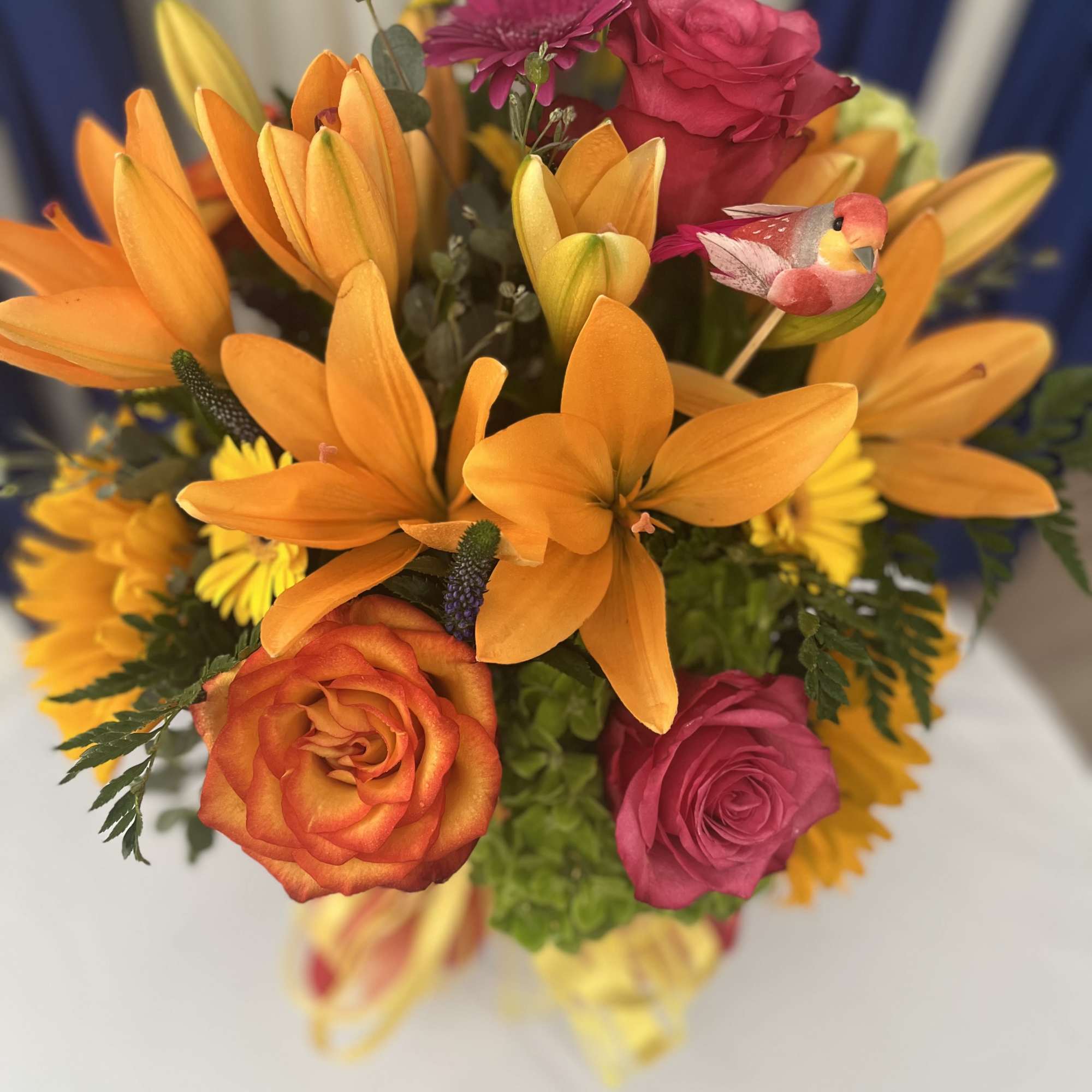 This arrangement is sure to brighten your mood! Orange lilies are so This arrangement is sure to brighten your mood! Orange lilies are so