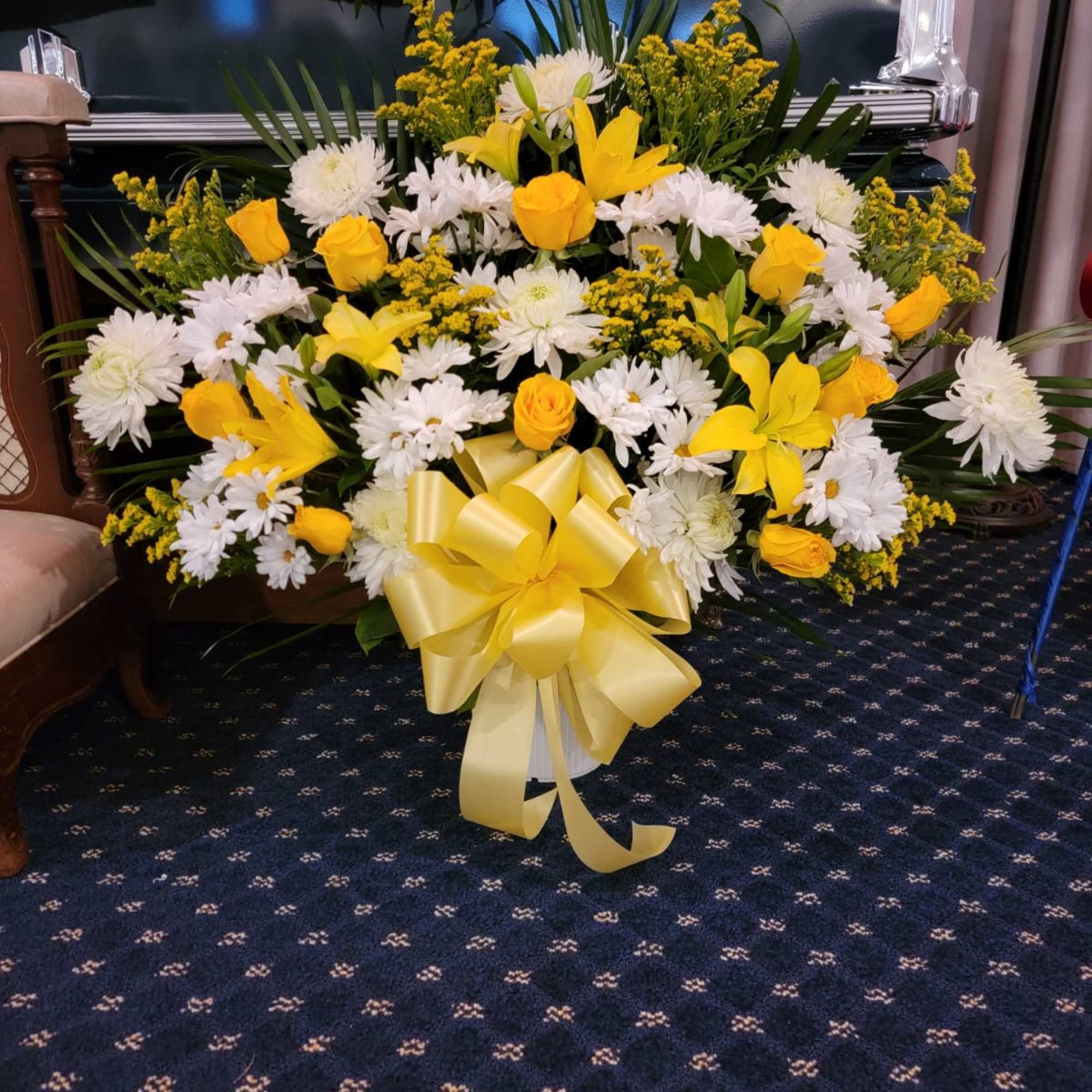 Yellow and white floor basket