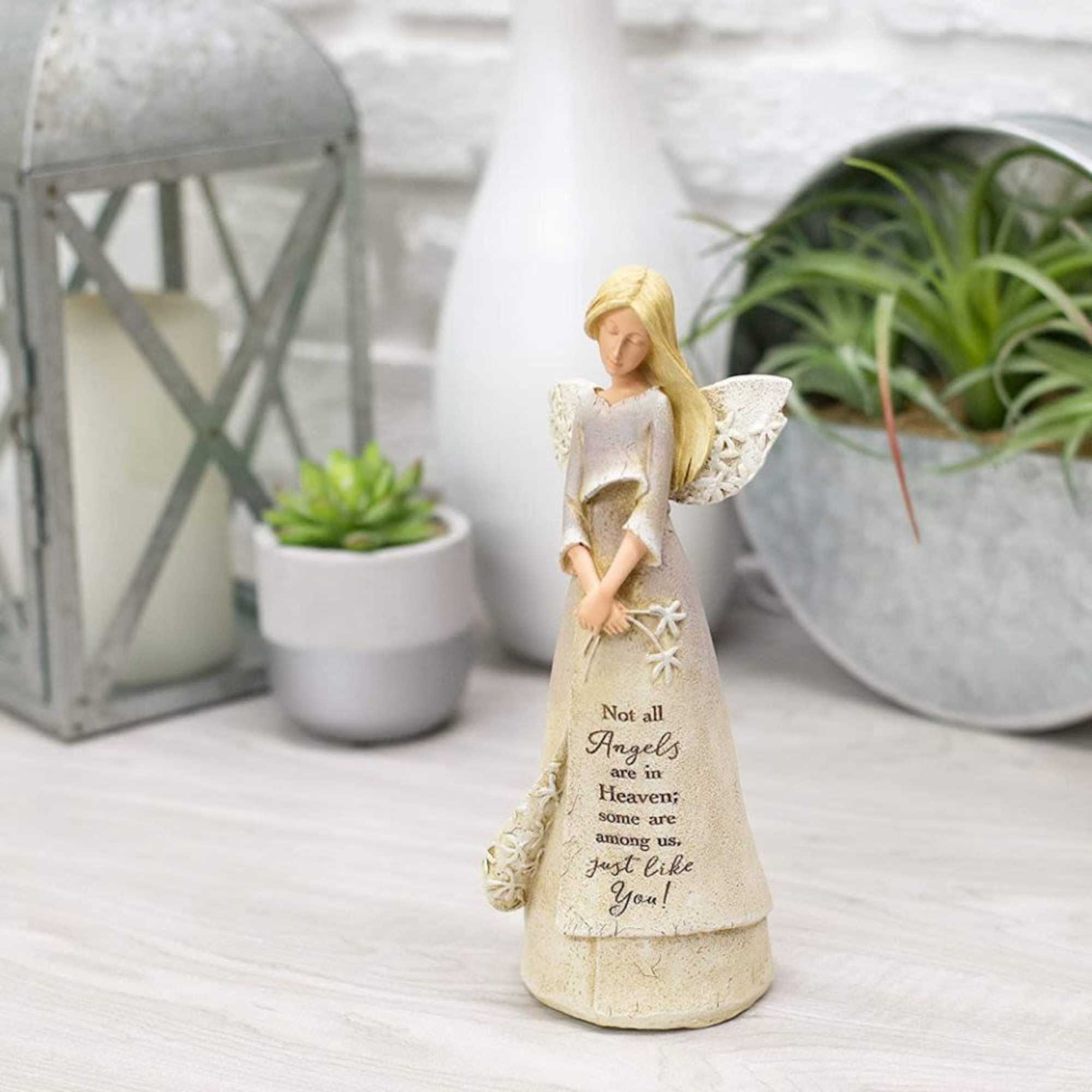 The Angels In Heaven angel figurine by Karen Hahn is inscribed with