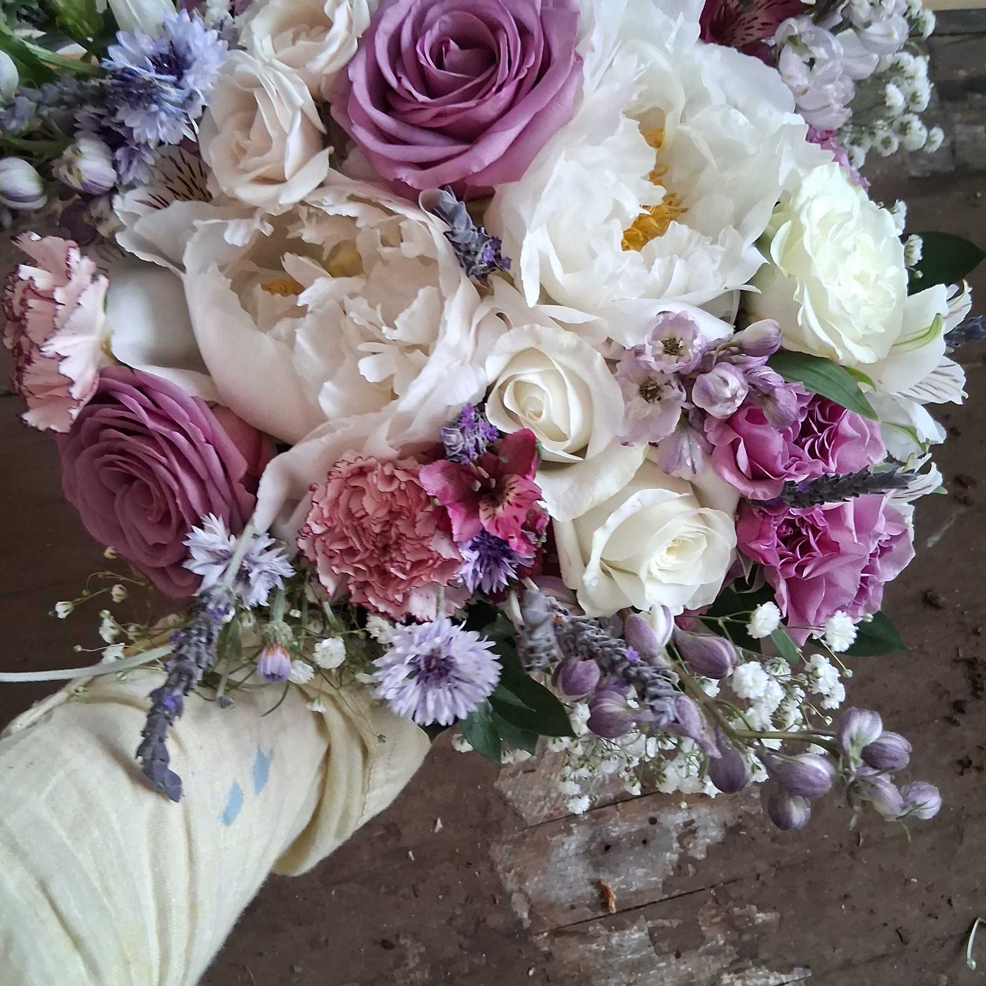 Beautiful moonlight/purple bridal vintage bouquet with white peonies, roses, alstroemeria, purple roses