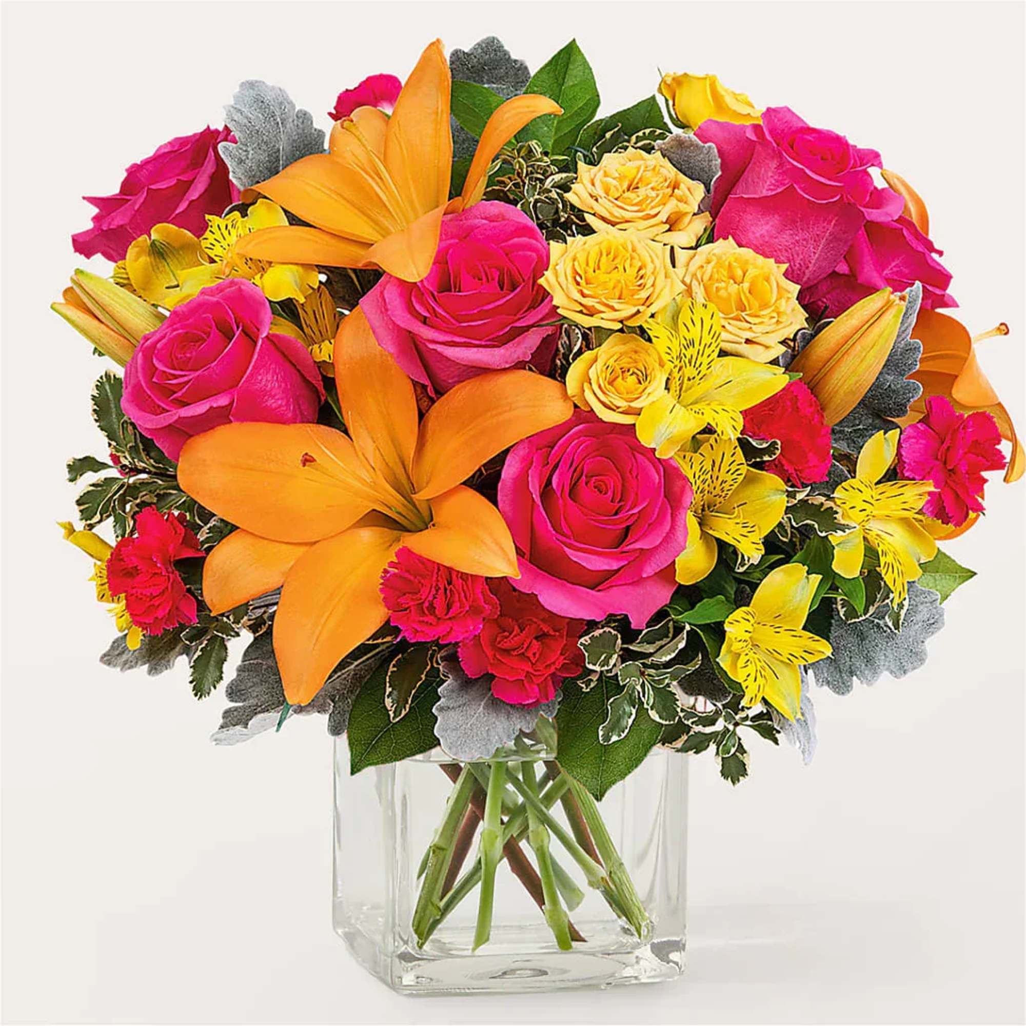 Teleport to the tropics with this vibrant bouquet, packed full of toasty