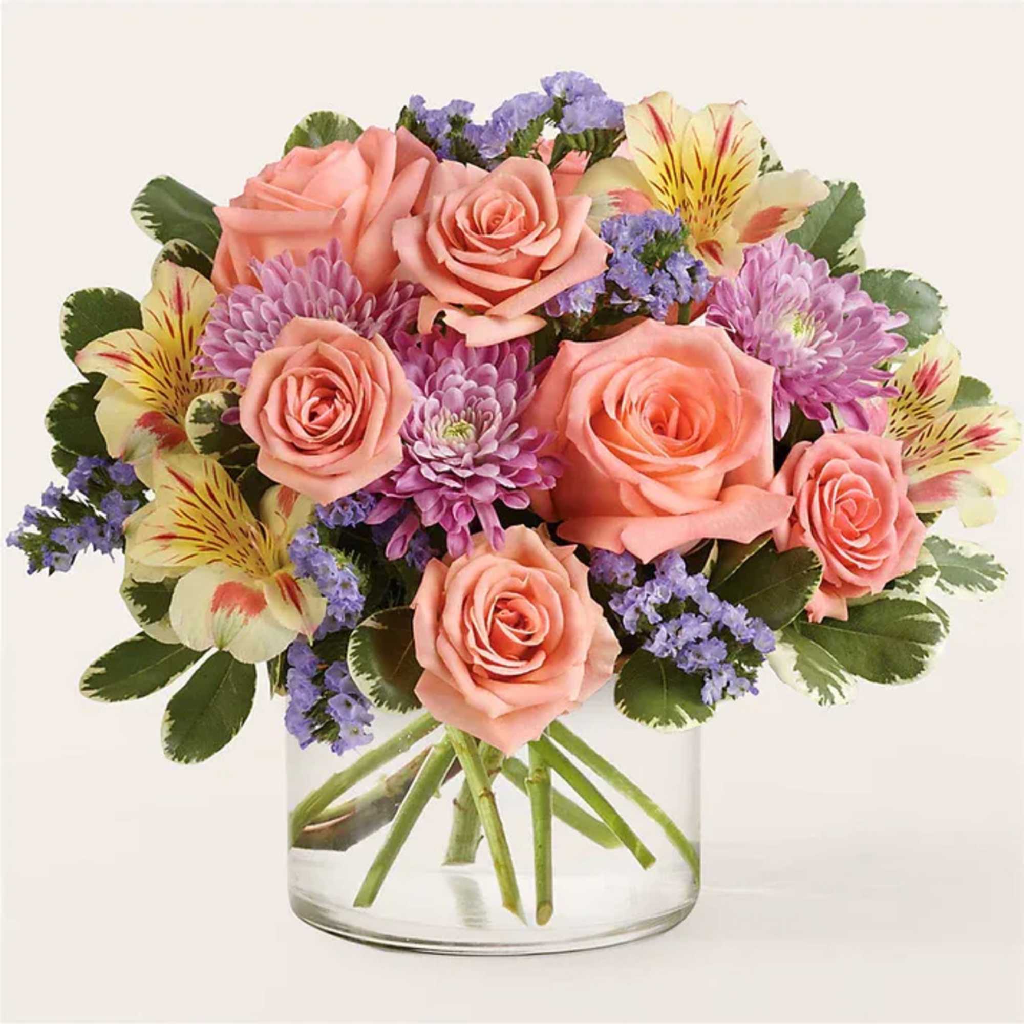 Sweeten their day with this pastel display of roses, alstroemeria, and chrysanthemums.
Details
Designed
