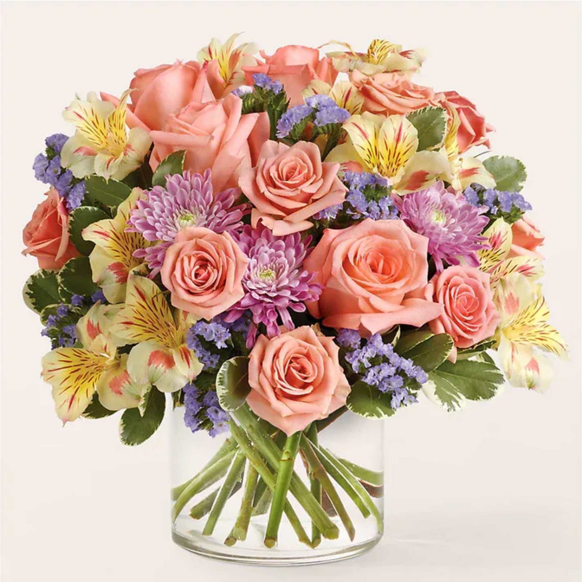 Sweeten their day with this pastel display of roses, alstroemeria, and chrysanthemums.
Details
Designed