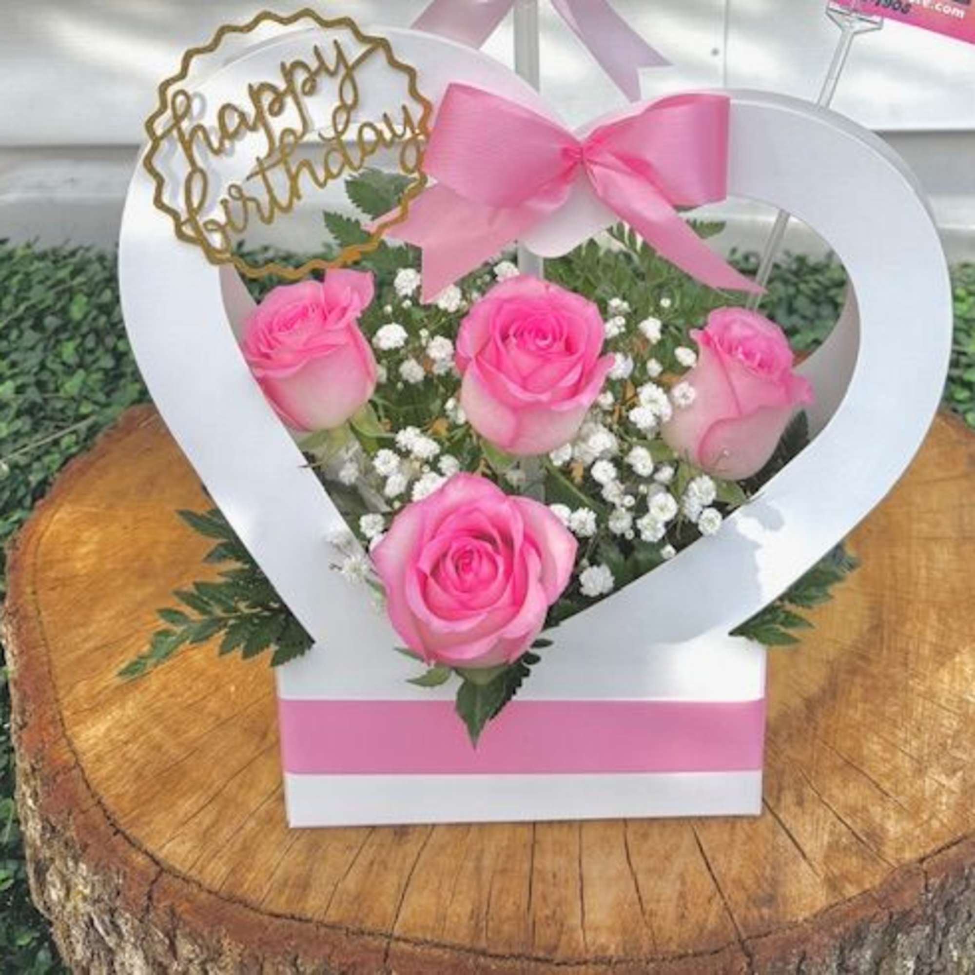 A graceful heart-shaped basket, sitting in pristine white, symbolizing purity, love, and