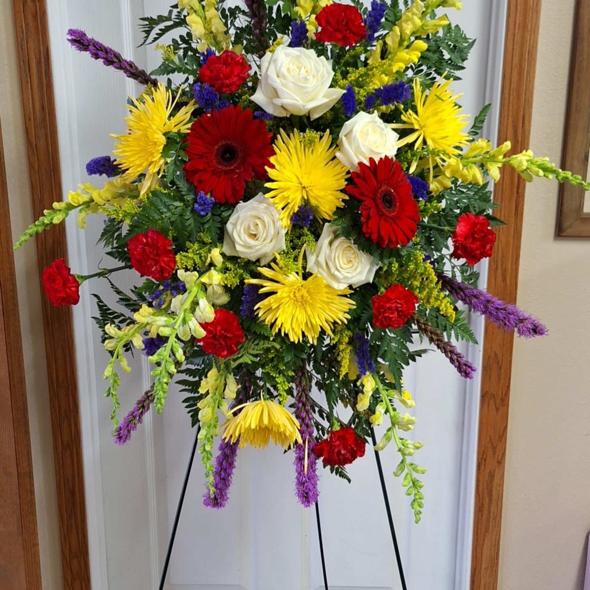 A beautiful mix of flowers that is bright and sweet for your