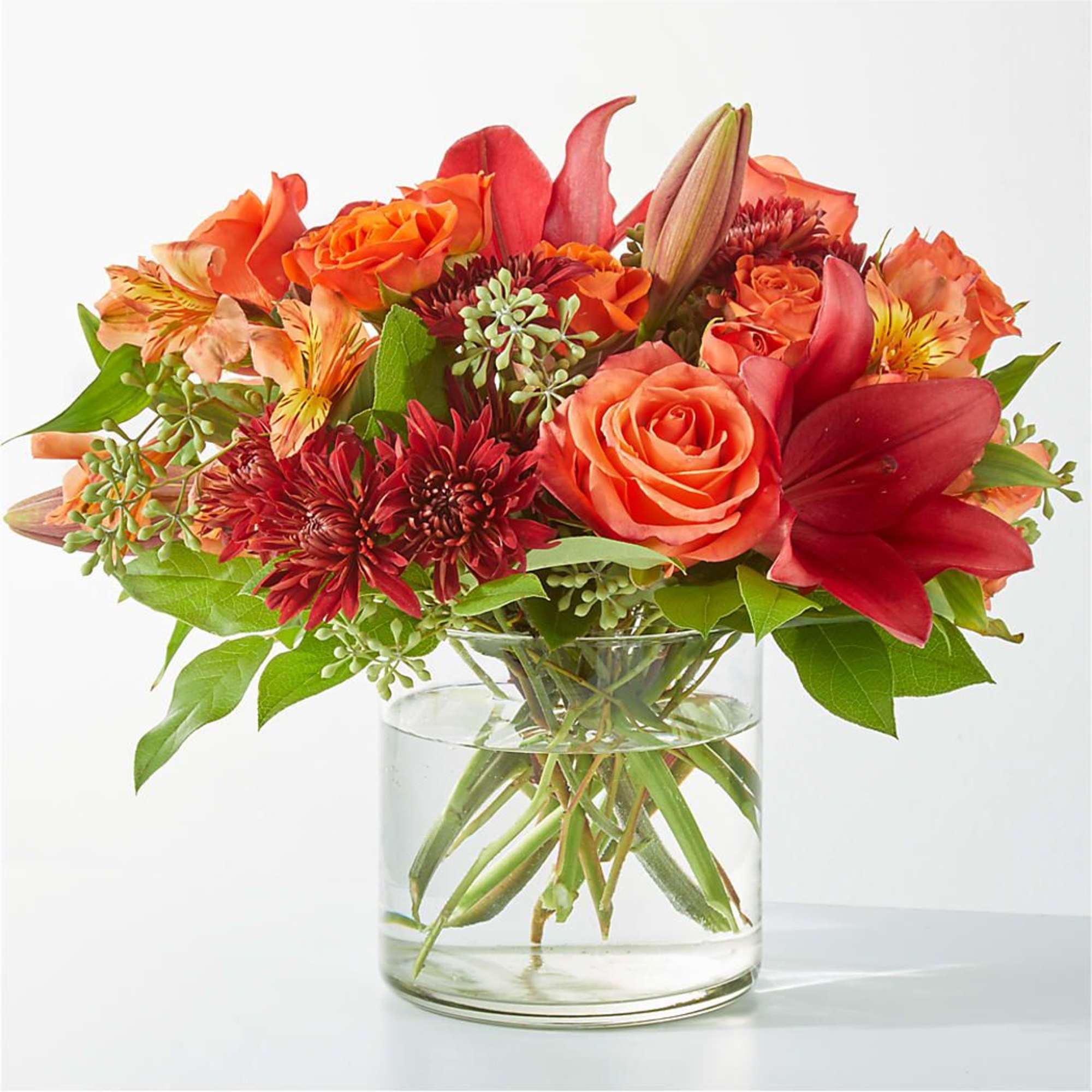 Capturing the colors of fall foliage, the Crimson Leaves Bouquet is an