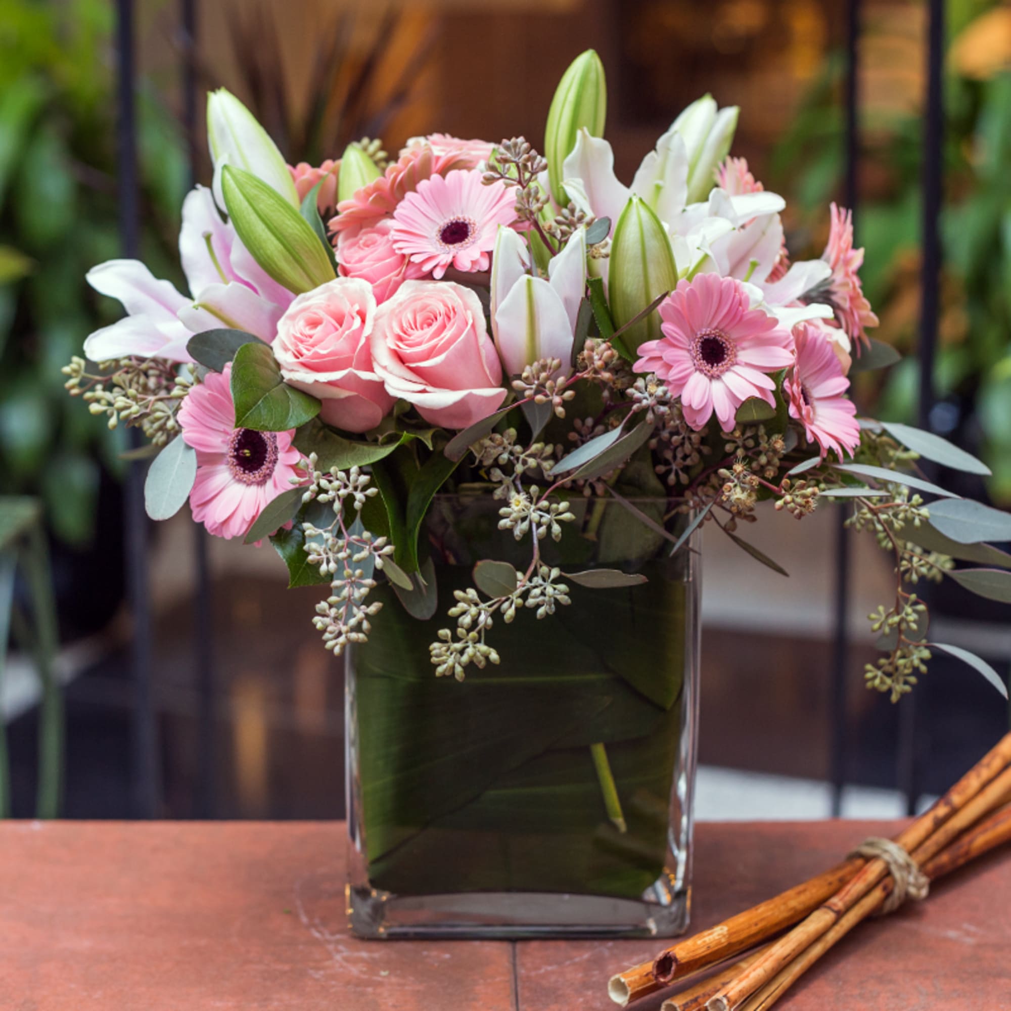 Sophisticated, clean, romantic and just because.  A tall rectangular clear glass Sophisticated, clean, romantic and just because.  A tall rectangular clear glass