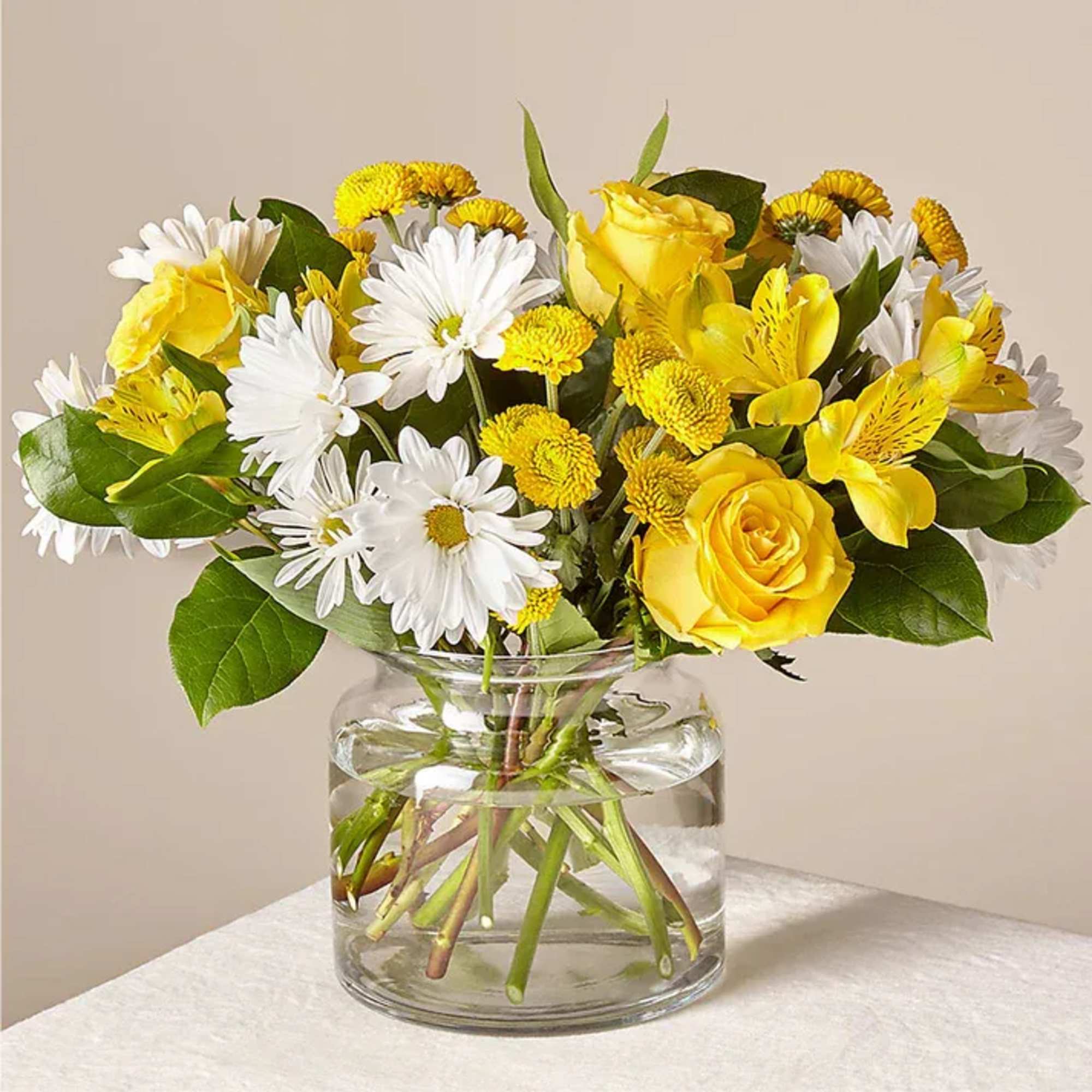 Share some sunshine with your loved ones with this cheery bouquet. Designed