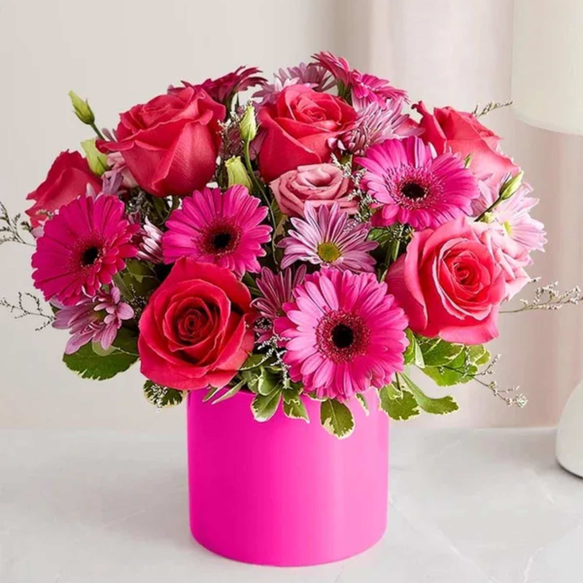 Think pink&rdquo; takes on new meaning with this vivacious bouquet, which comes