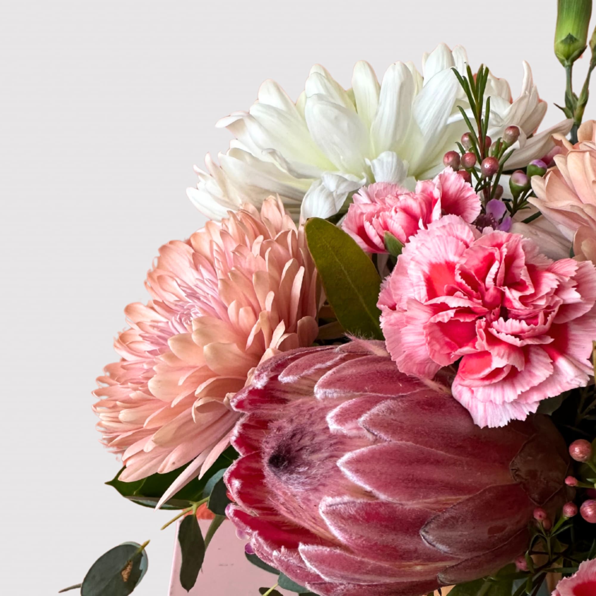 A vibrant, medium vase arrangement that brings color and joy.

Make a note