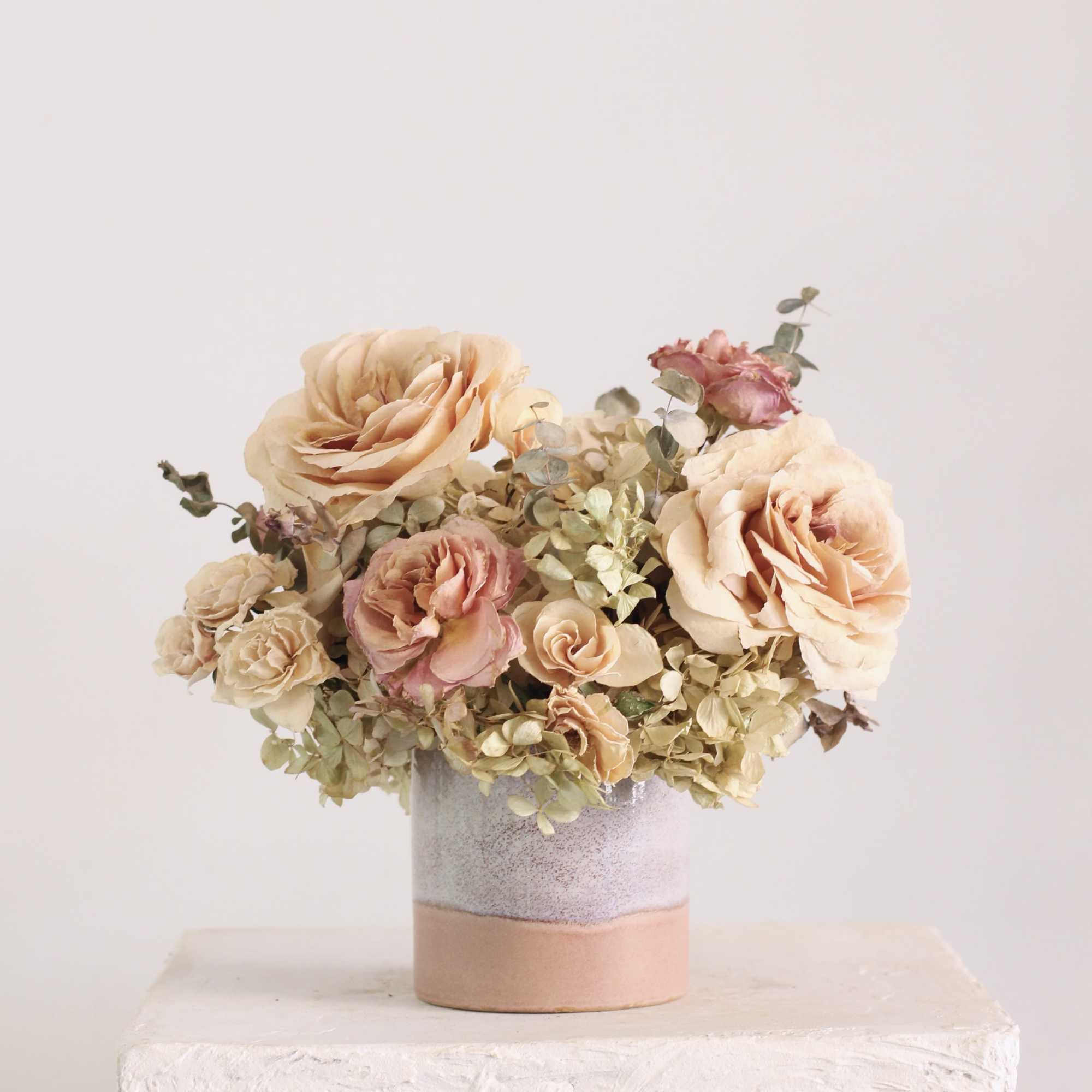 The Rosette centerpiece is a romantic dried floral arrangement that exudes timeless