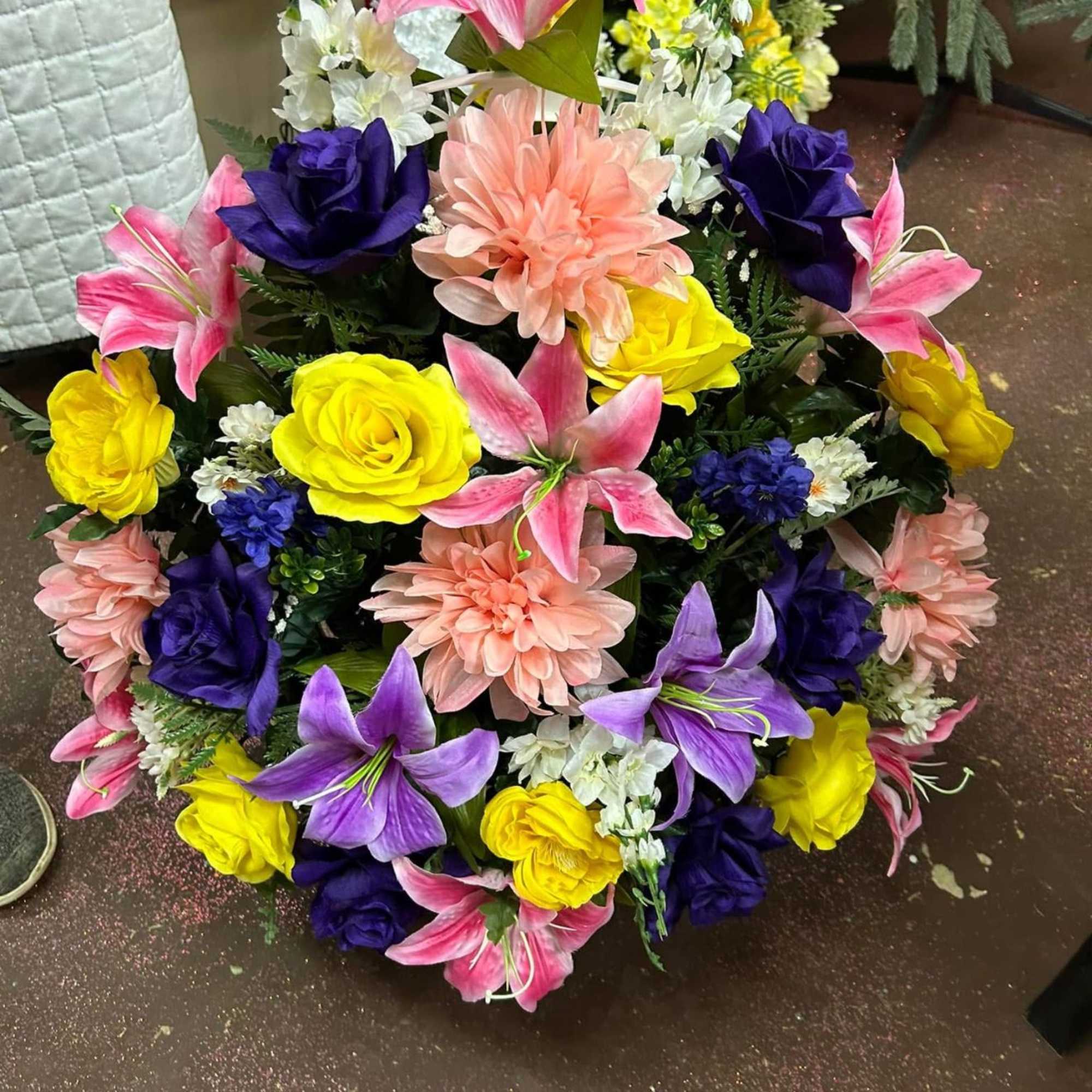 Our Silk Sympathy Basket Arrangements are a beautiful way to offer comfort