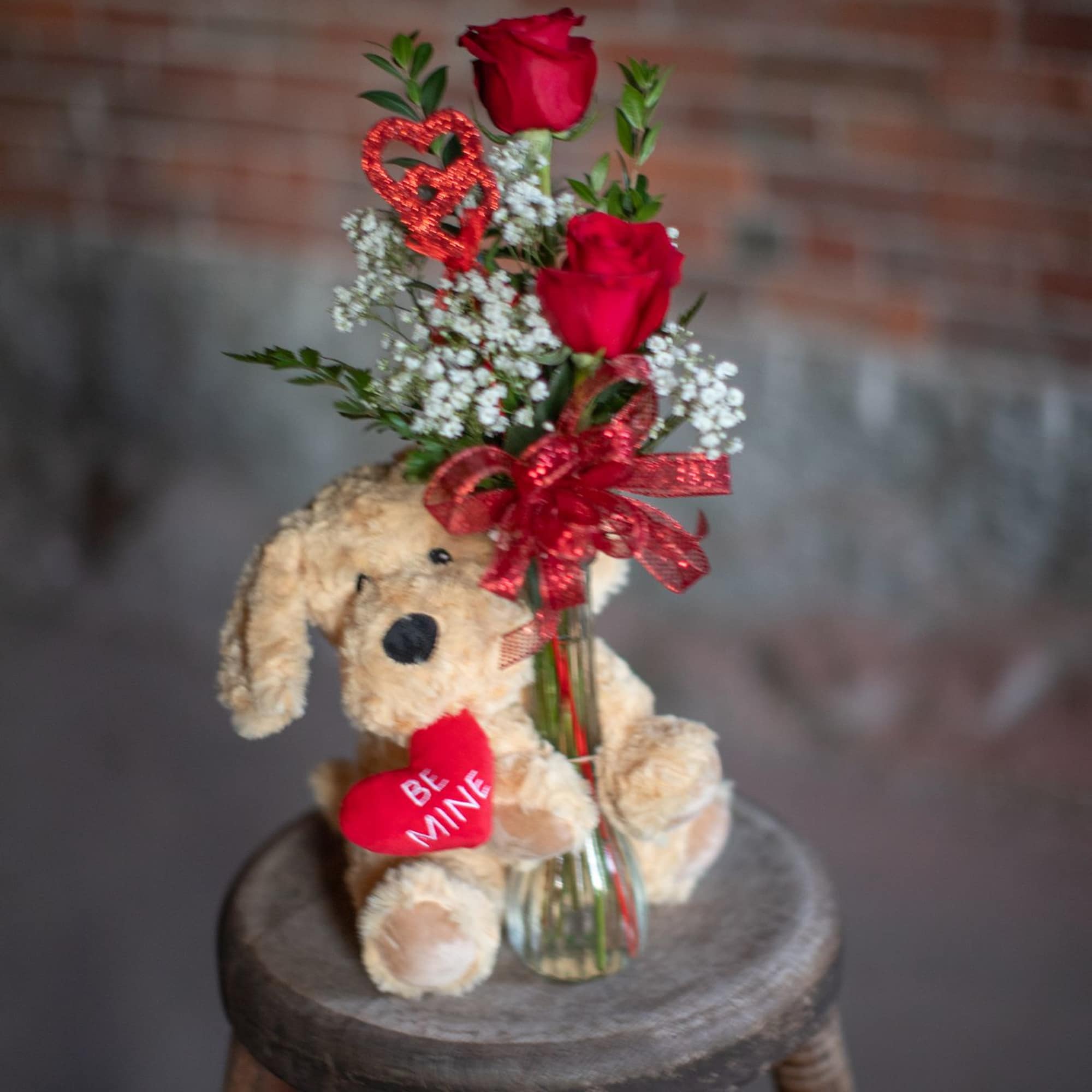 A perfect Valentine&#039;s day duo! A fun fluffy stuffy with fresh flowers.