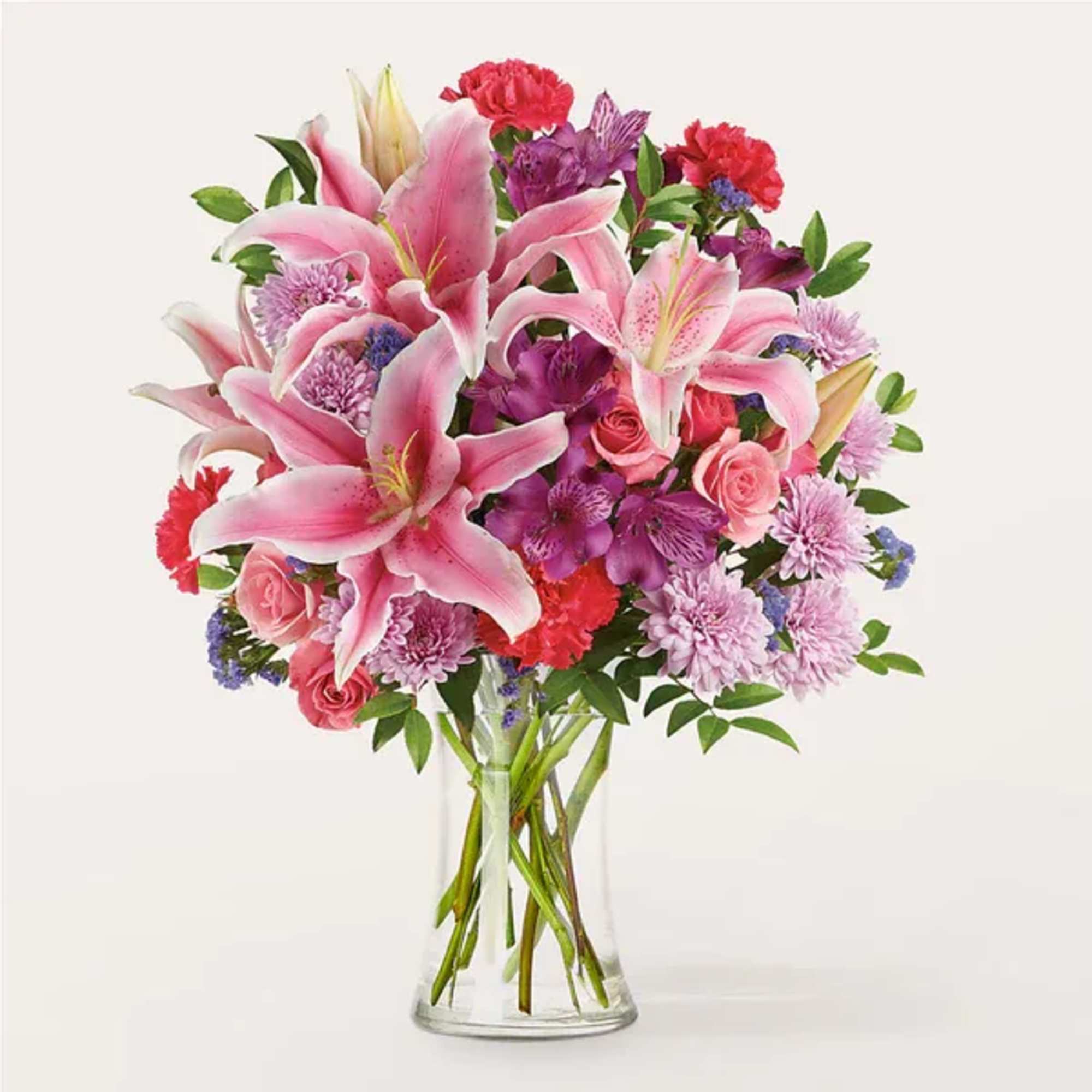 Pink lilies, carnations and spray roses will effortlessly relay your heartfelt message.