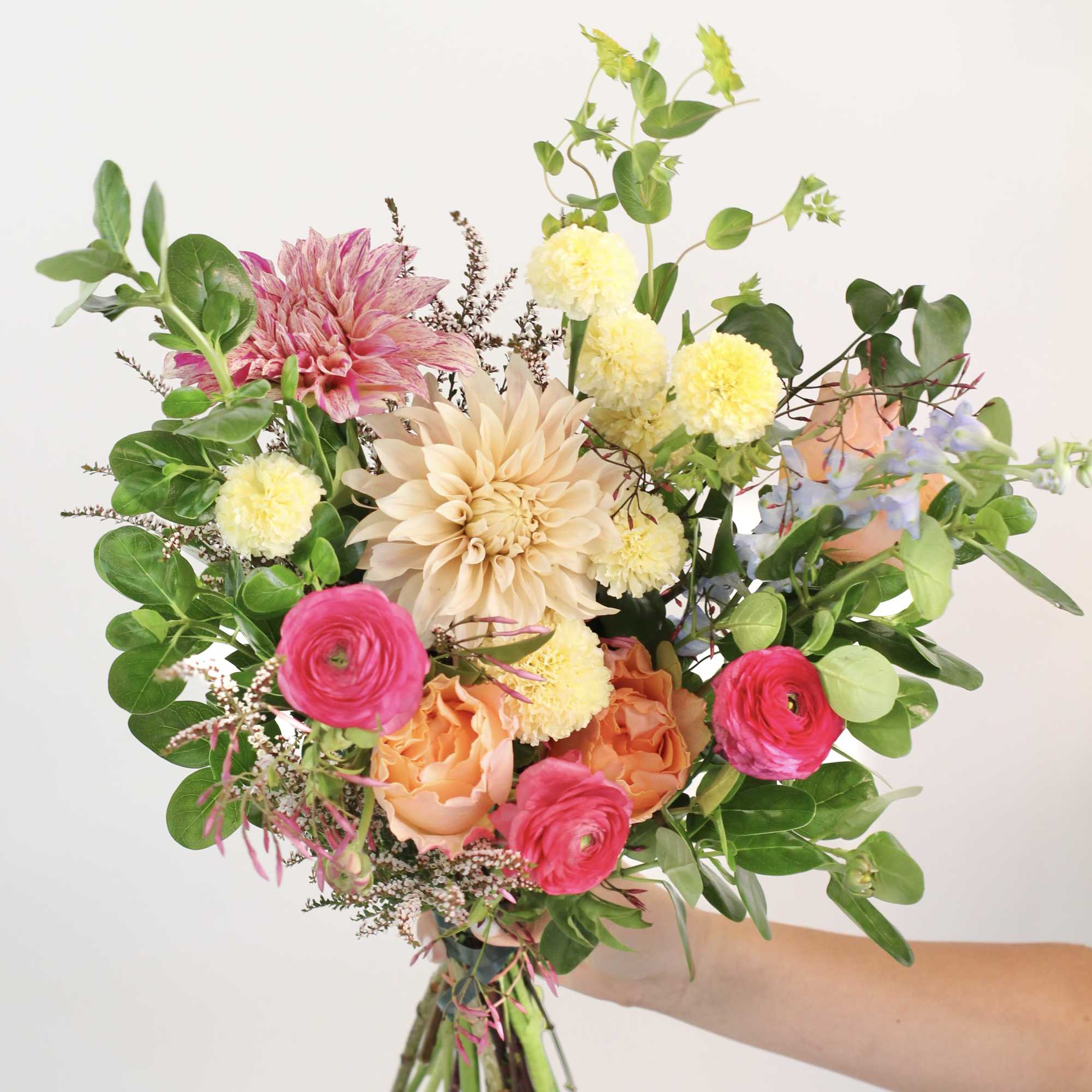 Experience a truly unique and captivating floral arrangement. Our florists craft each