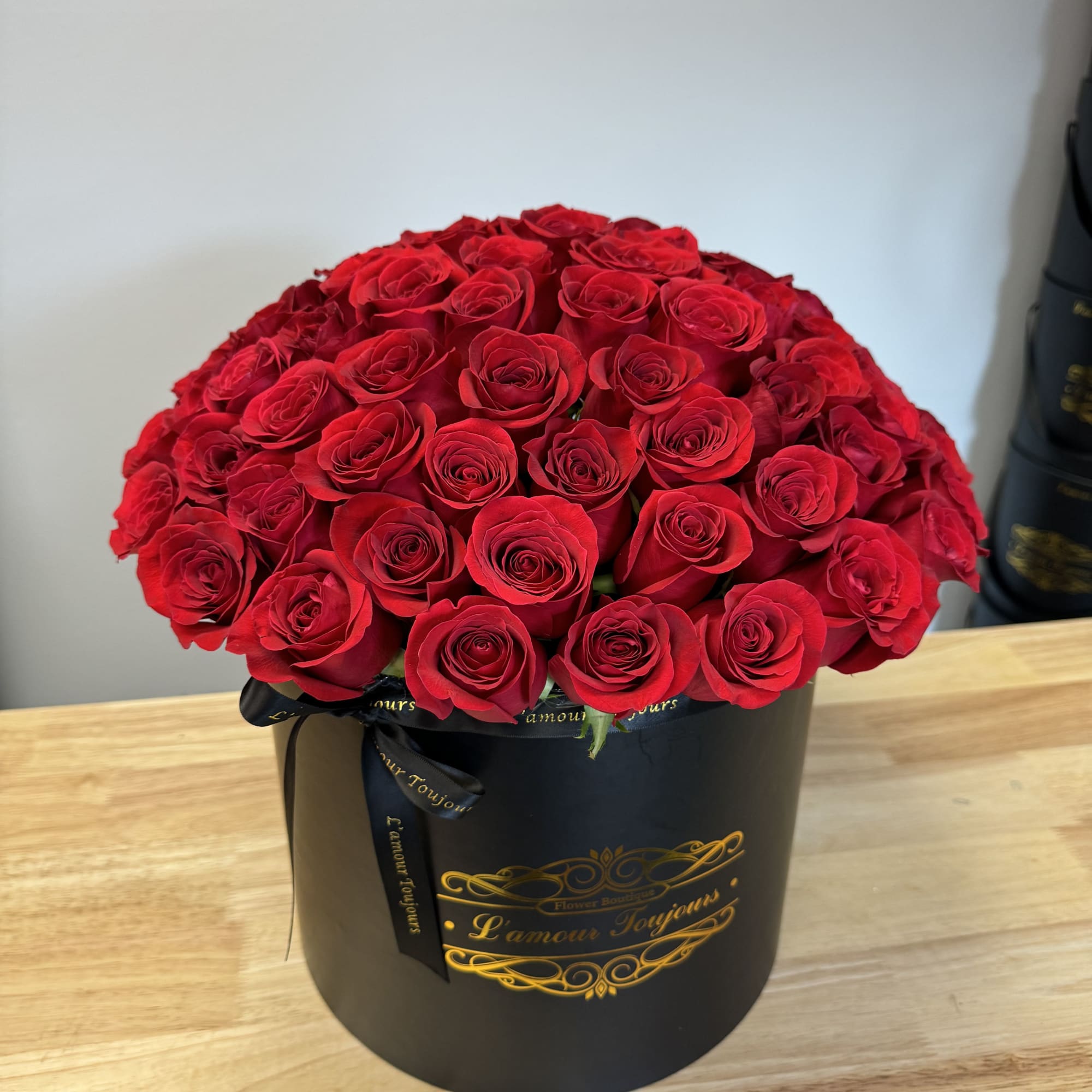 75 Premium roses in a Signature Box