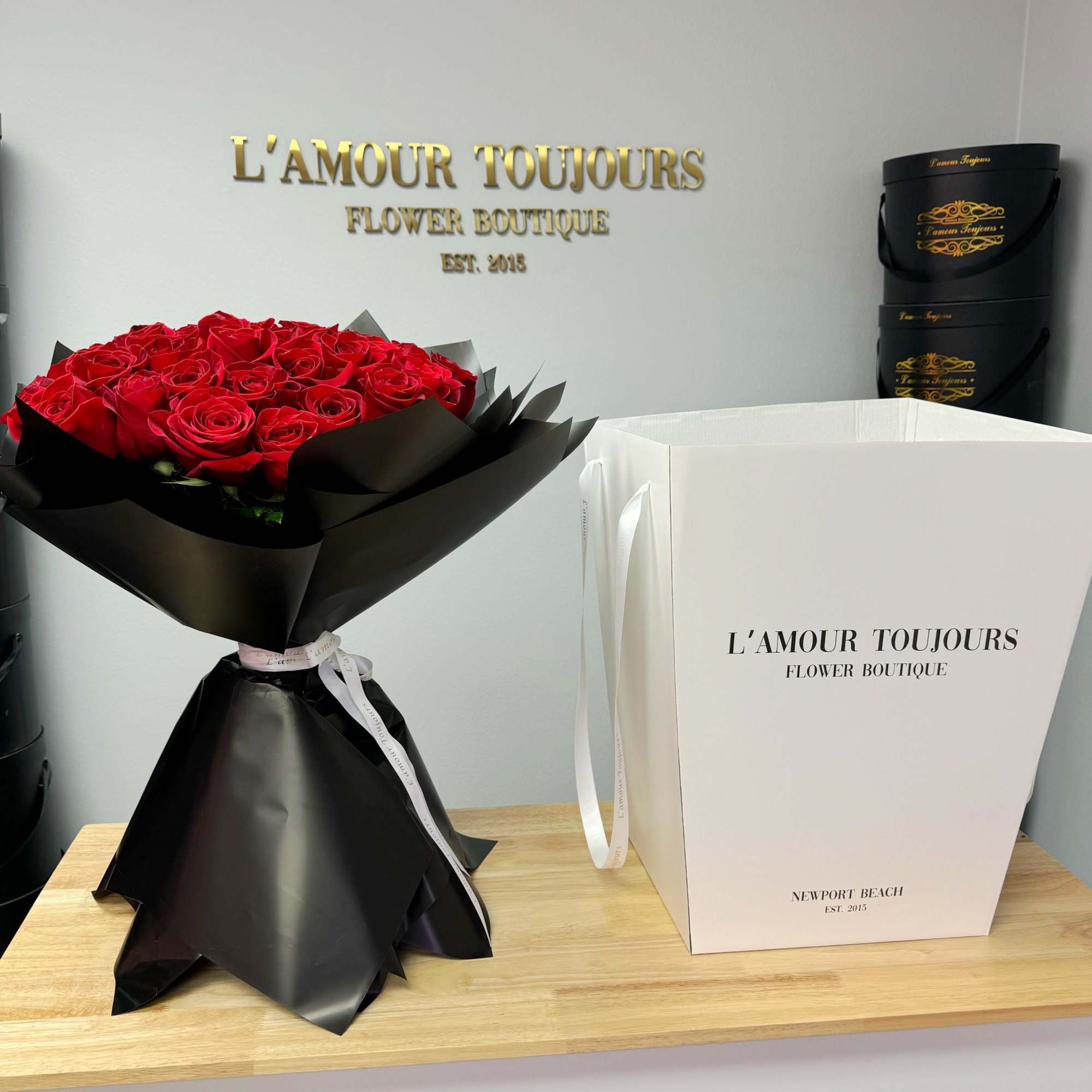 Wow her with a hand-tied signature bouquet of long stem roses. The