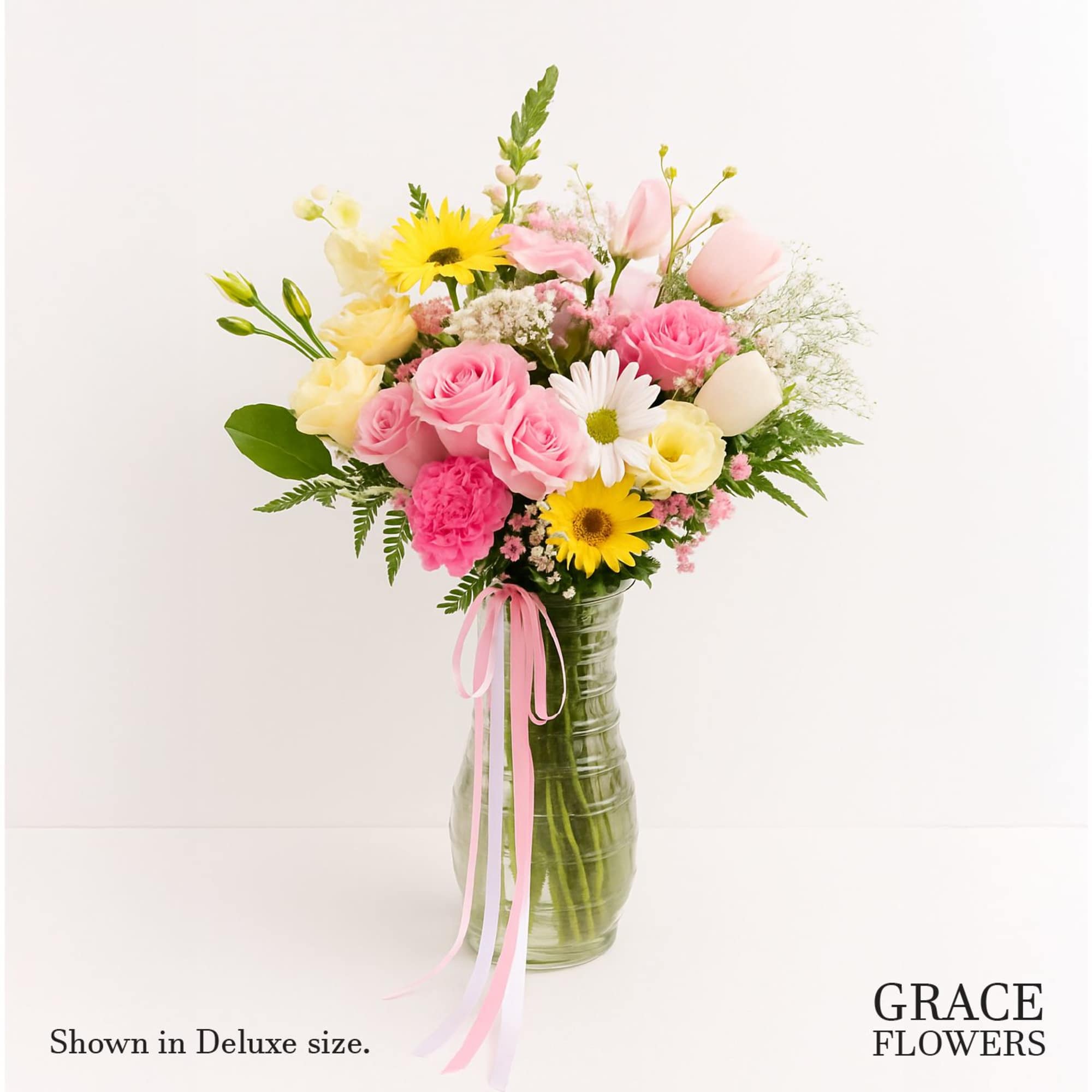 Bliss Ensemble is a radiant medley of delicate blooms &mdash; featuring pink