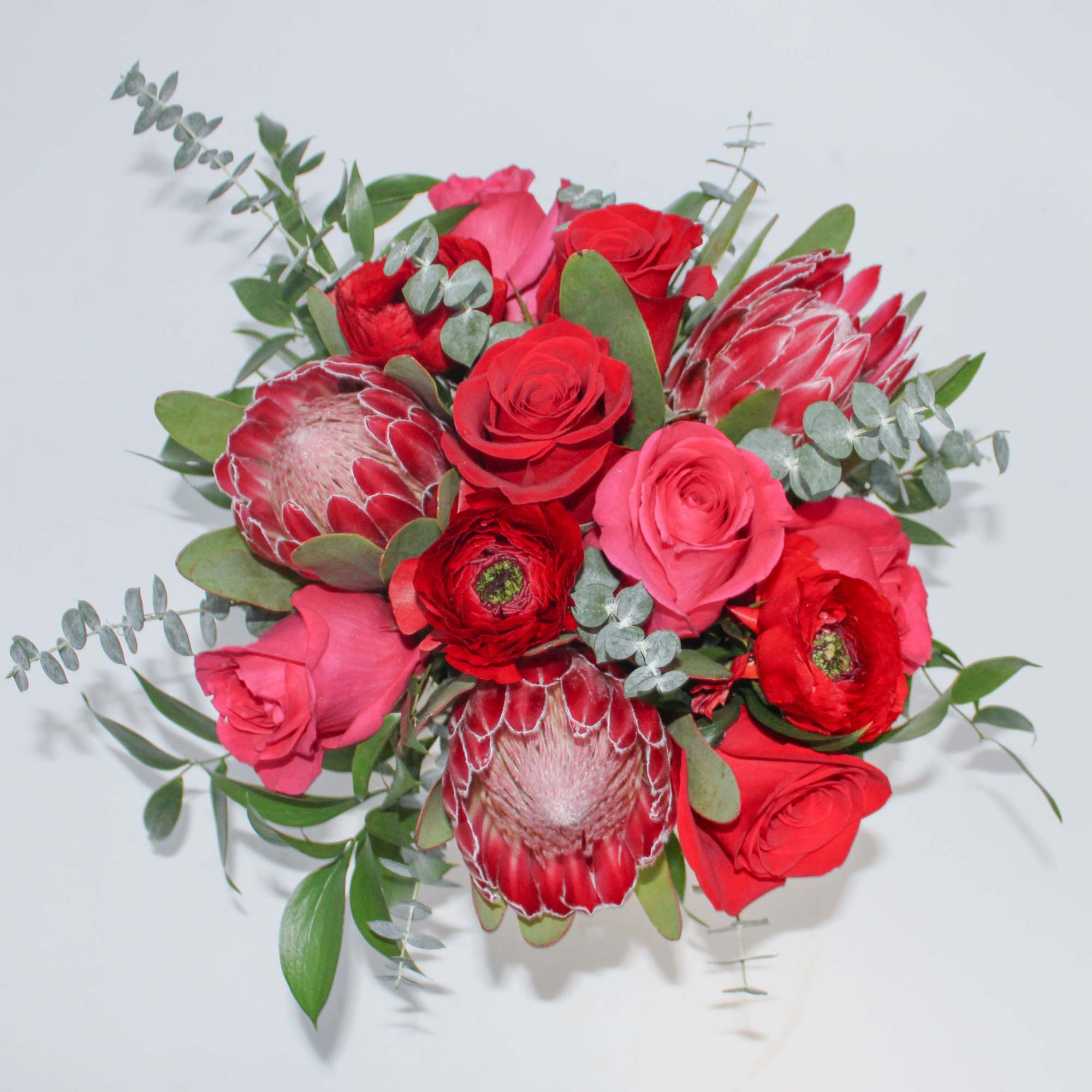 A beautiful display of mixed tropical and garden flowers; Fine Flower&#039;s in