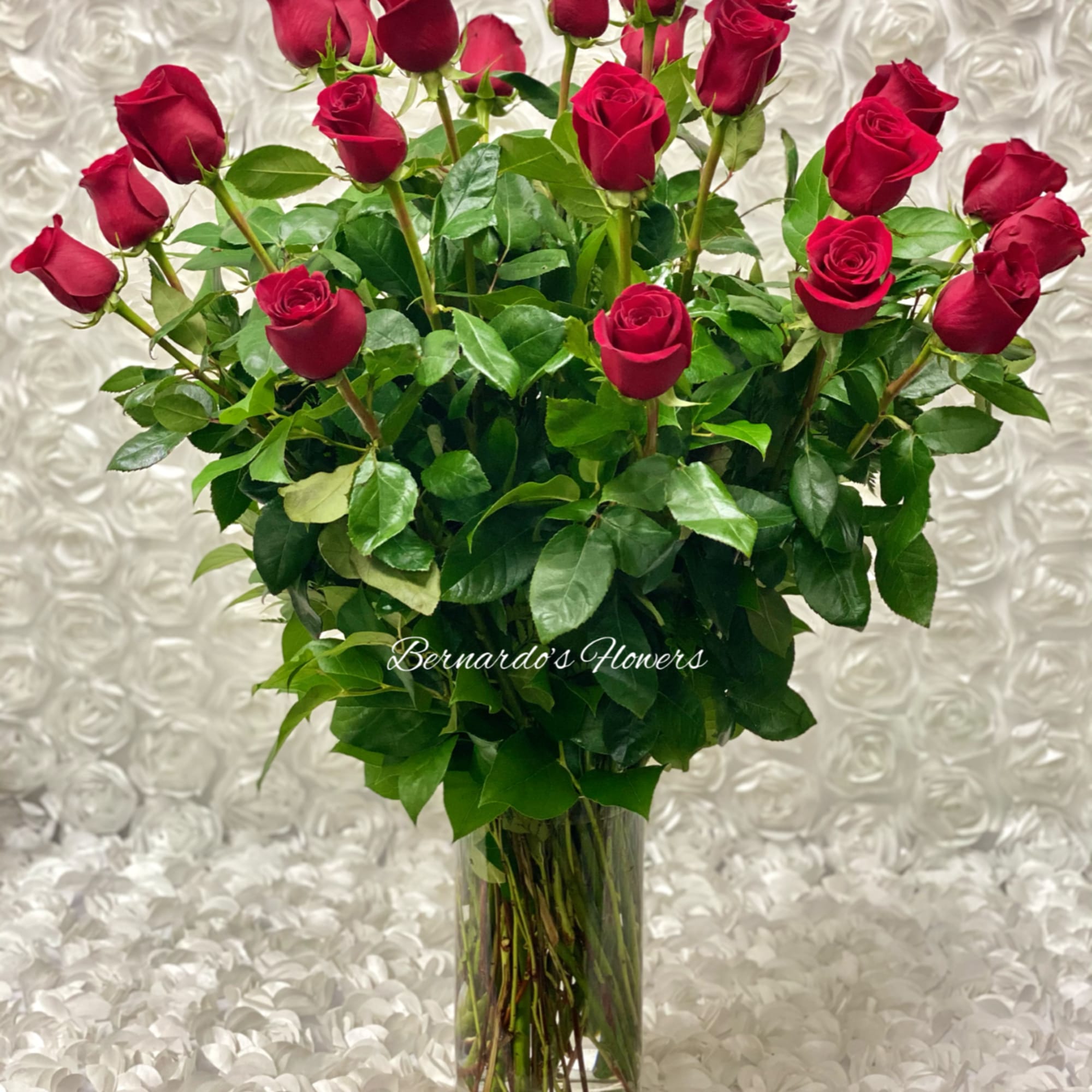 2 Dz. Premium Red Roses in a Tall Cylinder Glass Vase
Style: Round