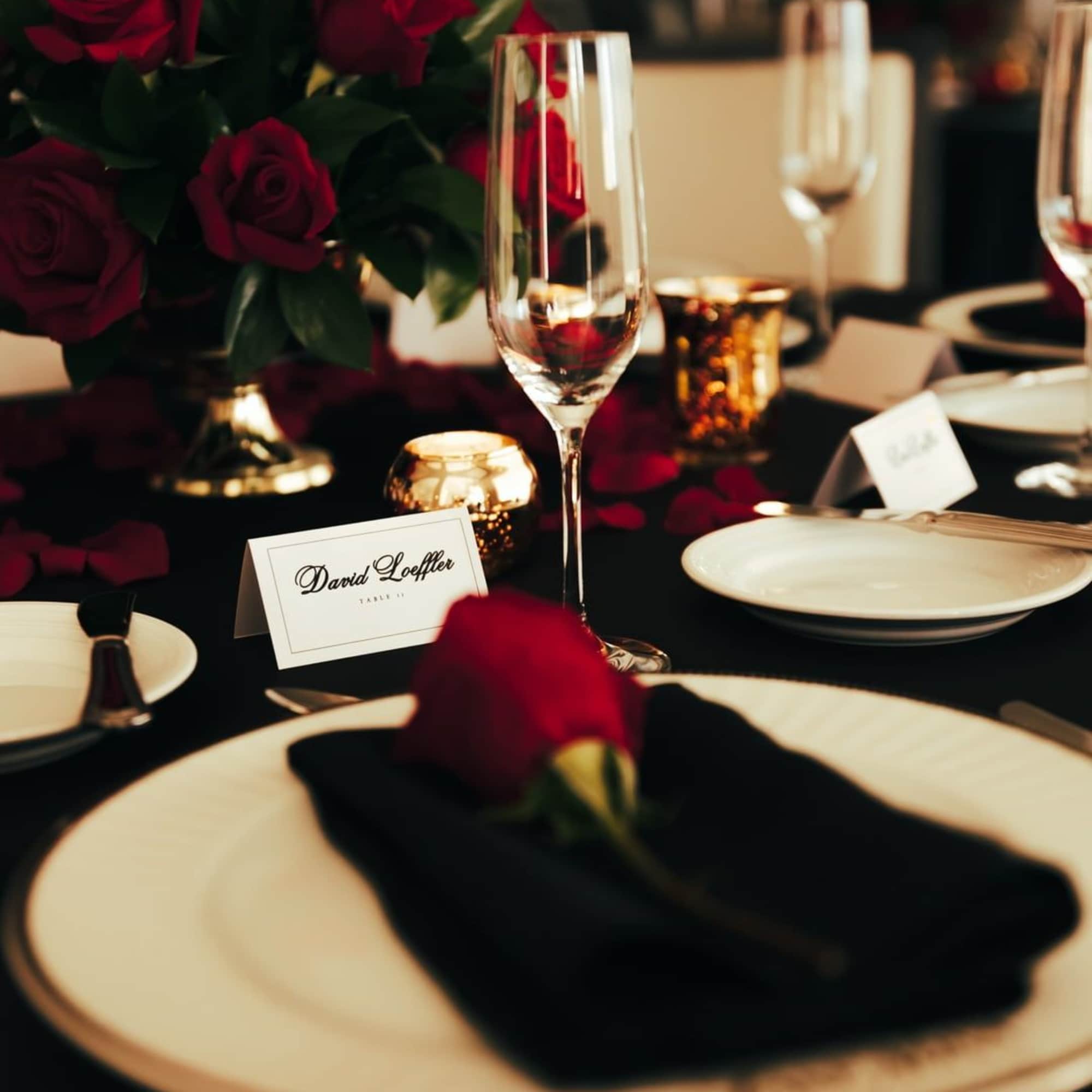 A full, round arrangement of red roses and fresh greens—perfect for timeless A full, round arrangement of red roses and fresh greens—perfect for timeless