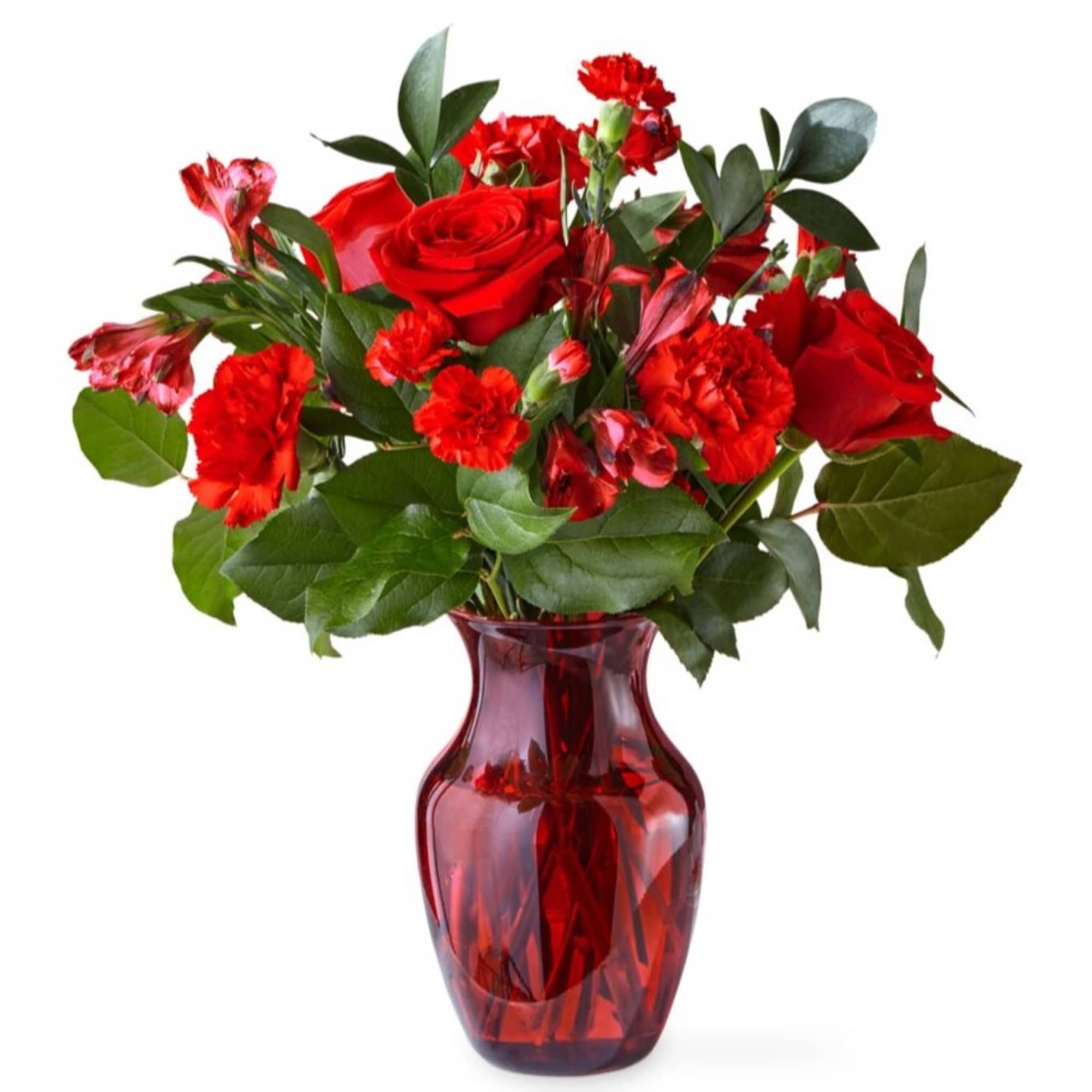 Amplified by a ruby red vase, this rich arrangement of roses and