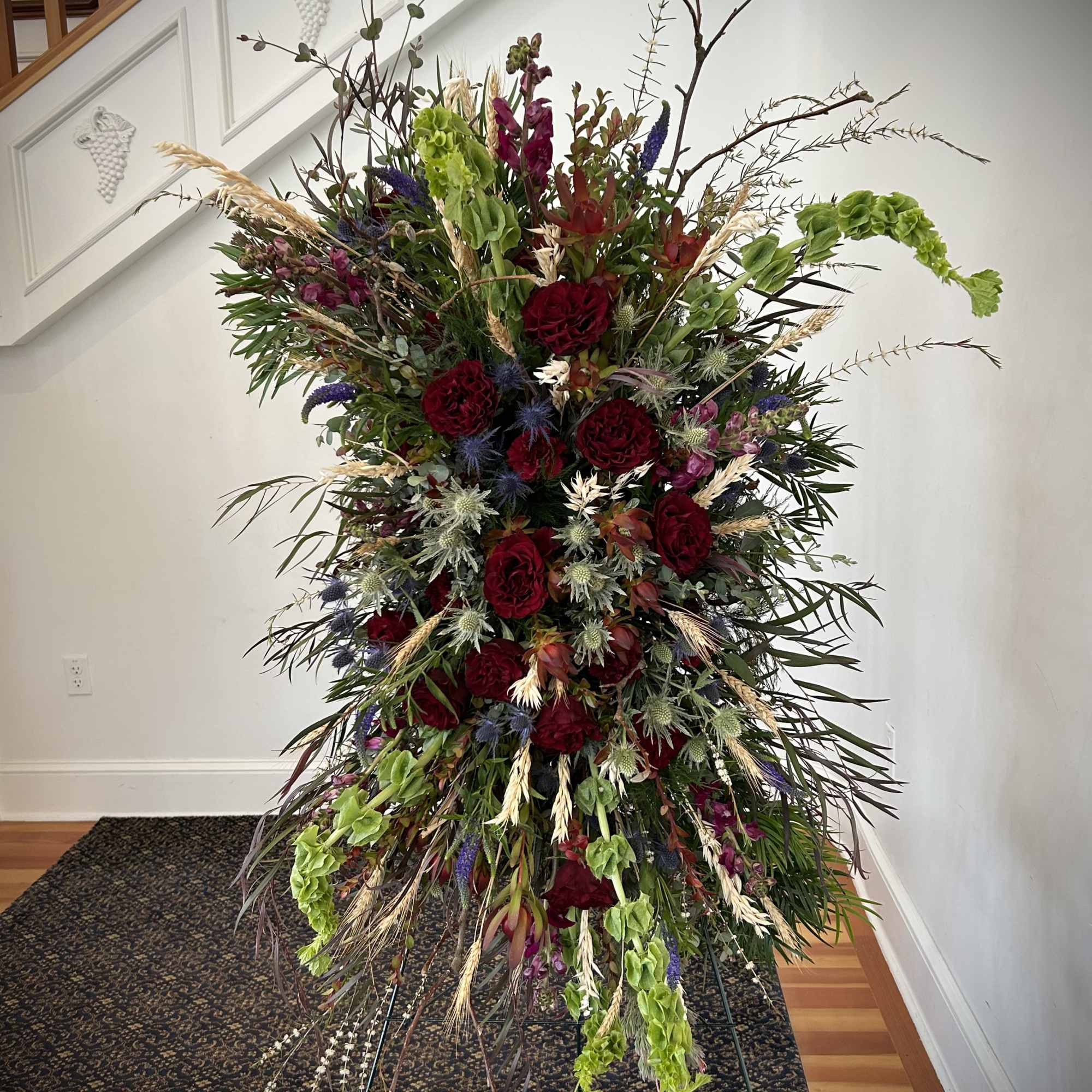 We create memorial sprays ranging from traditional neutral displays of white and