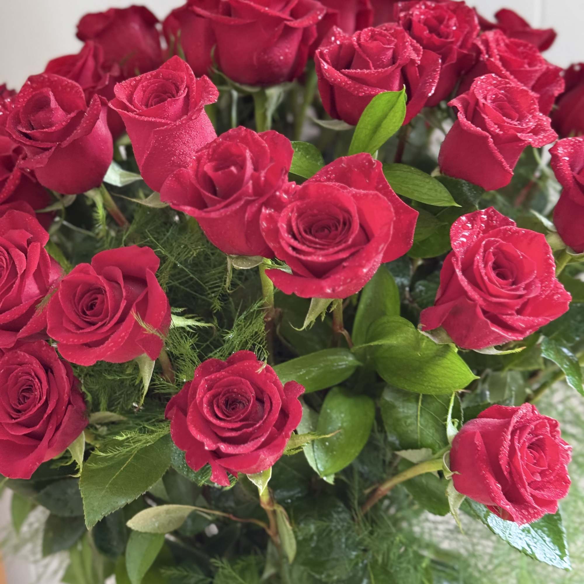 Surprise your loved one with our stunning 48 stems red rose arrangement