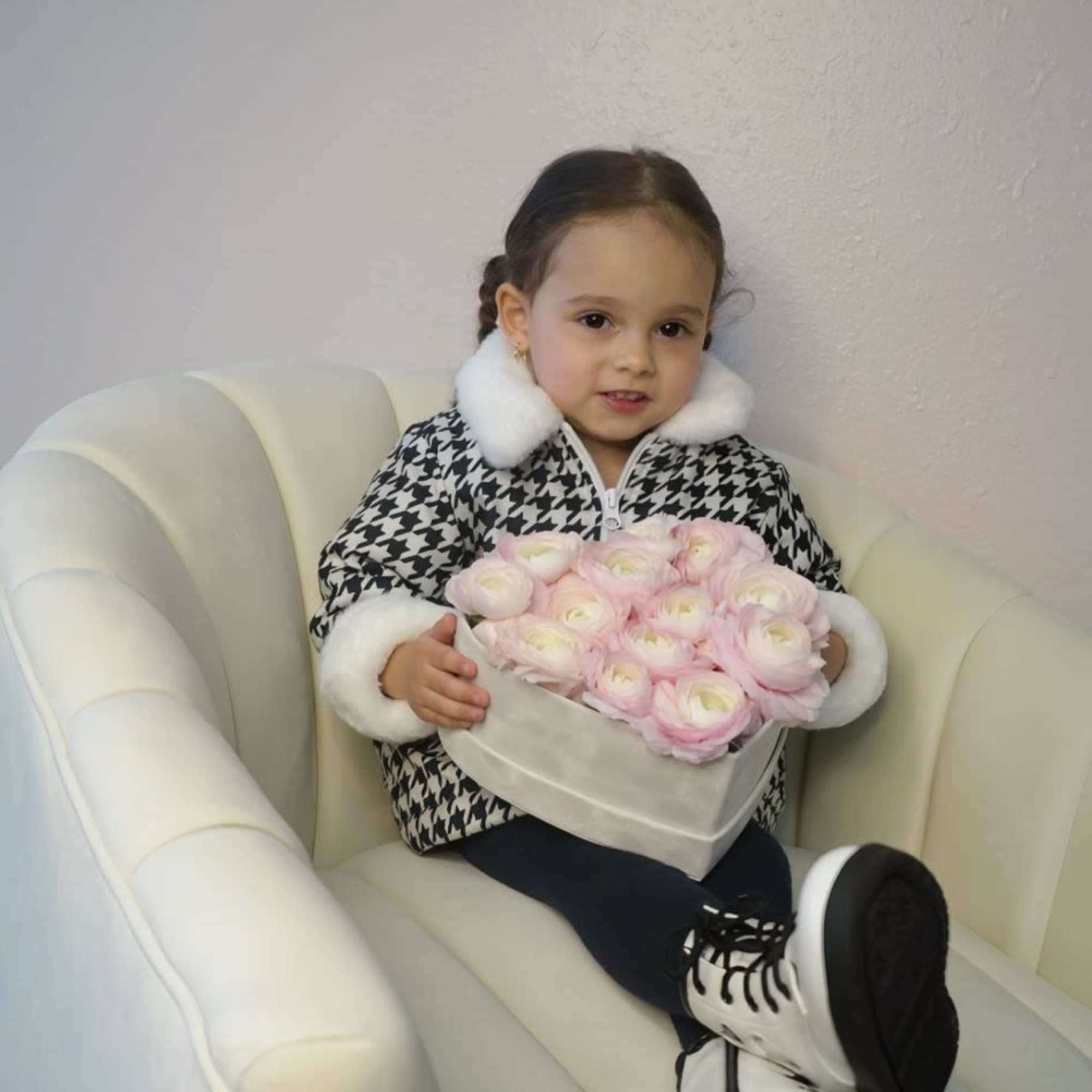 A sweet and delicate arrangement with imported ranunculus, perfect for little girls