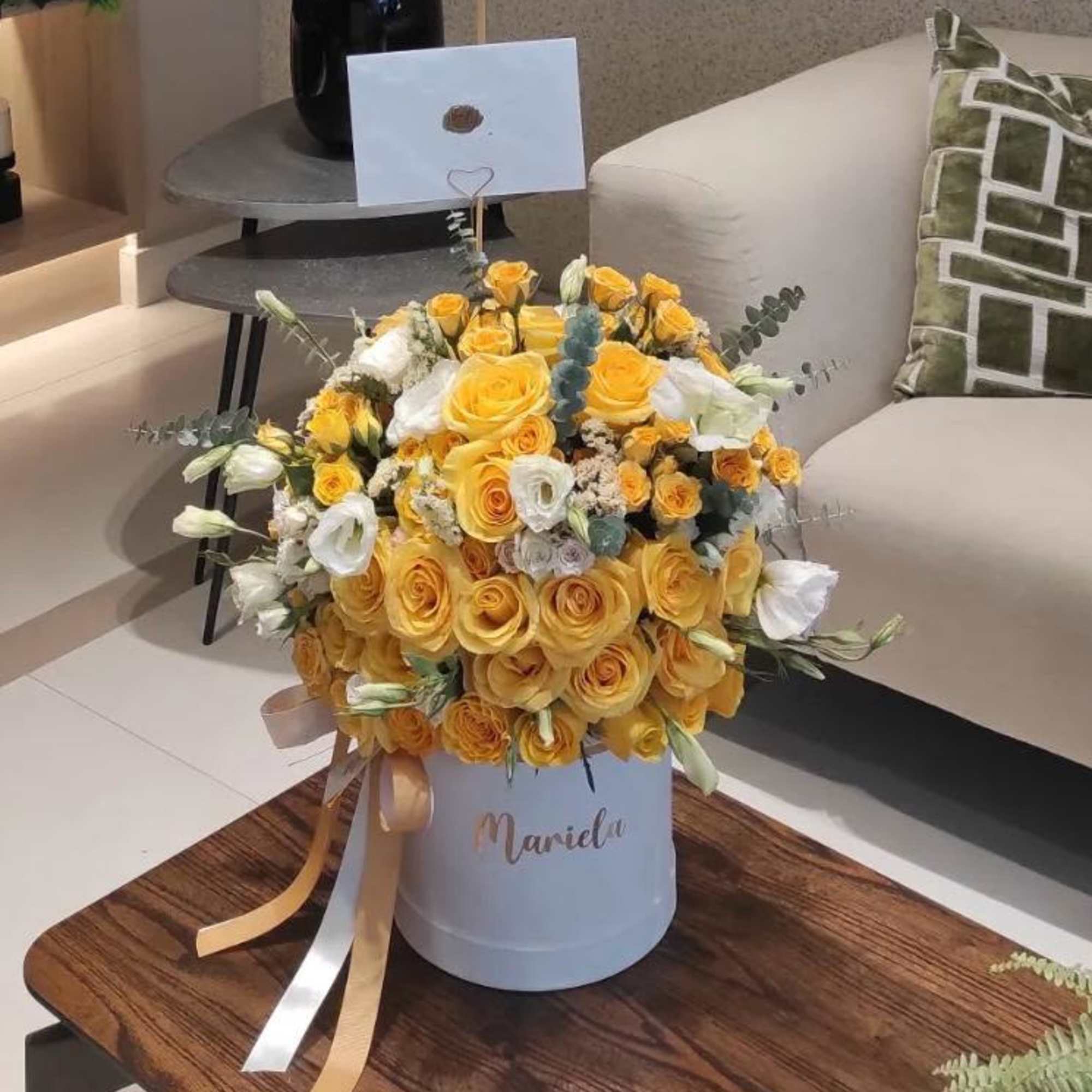A radiant floral arrangement in shades of yellow that reflects joy, strength