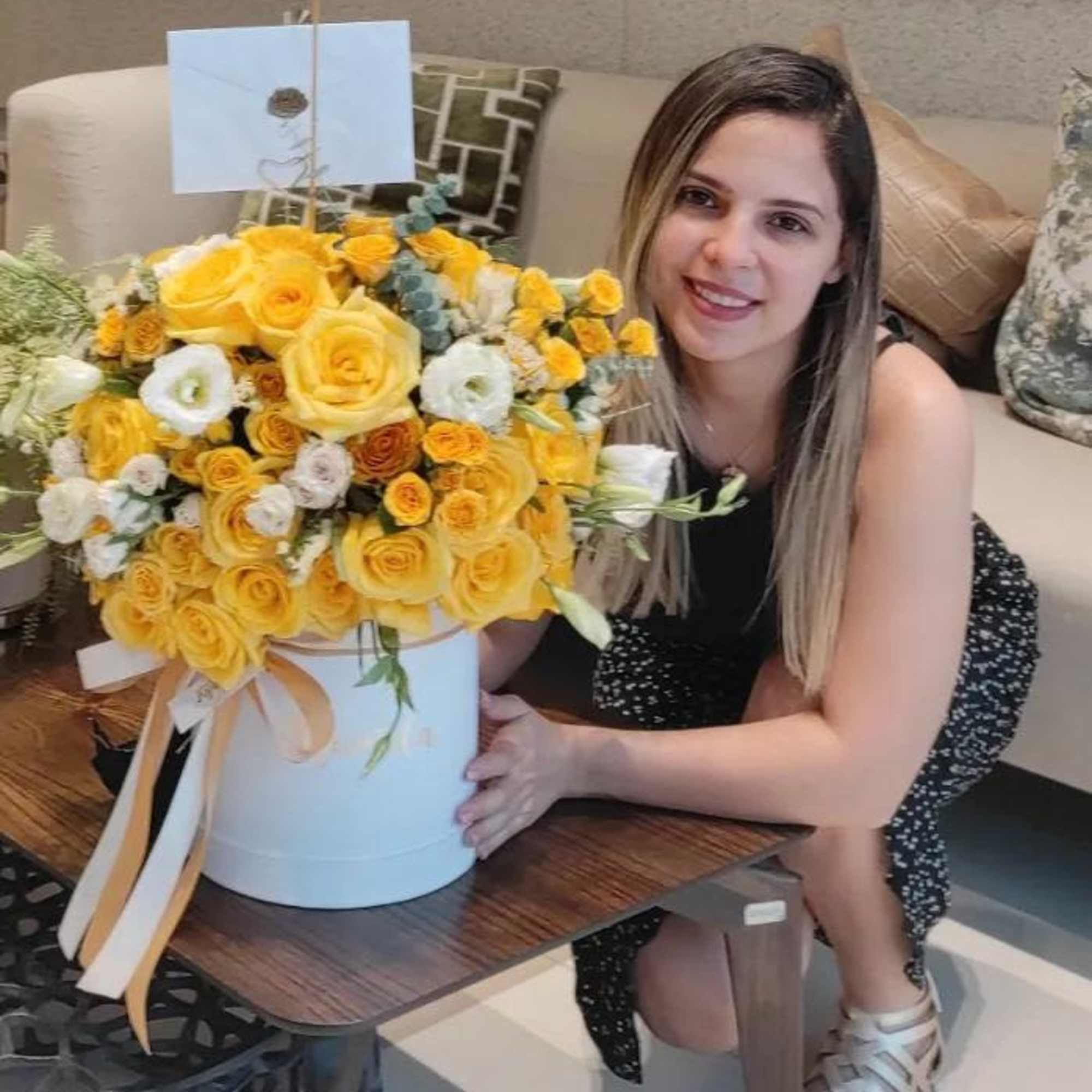 A radiant floral arrangement in shades of yellow that reflects joy, strength