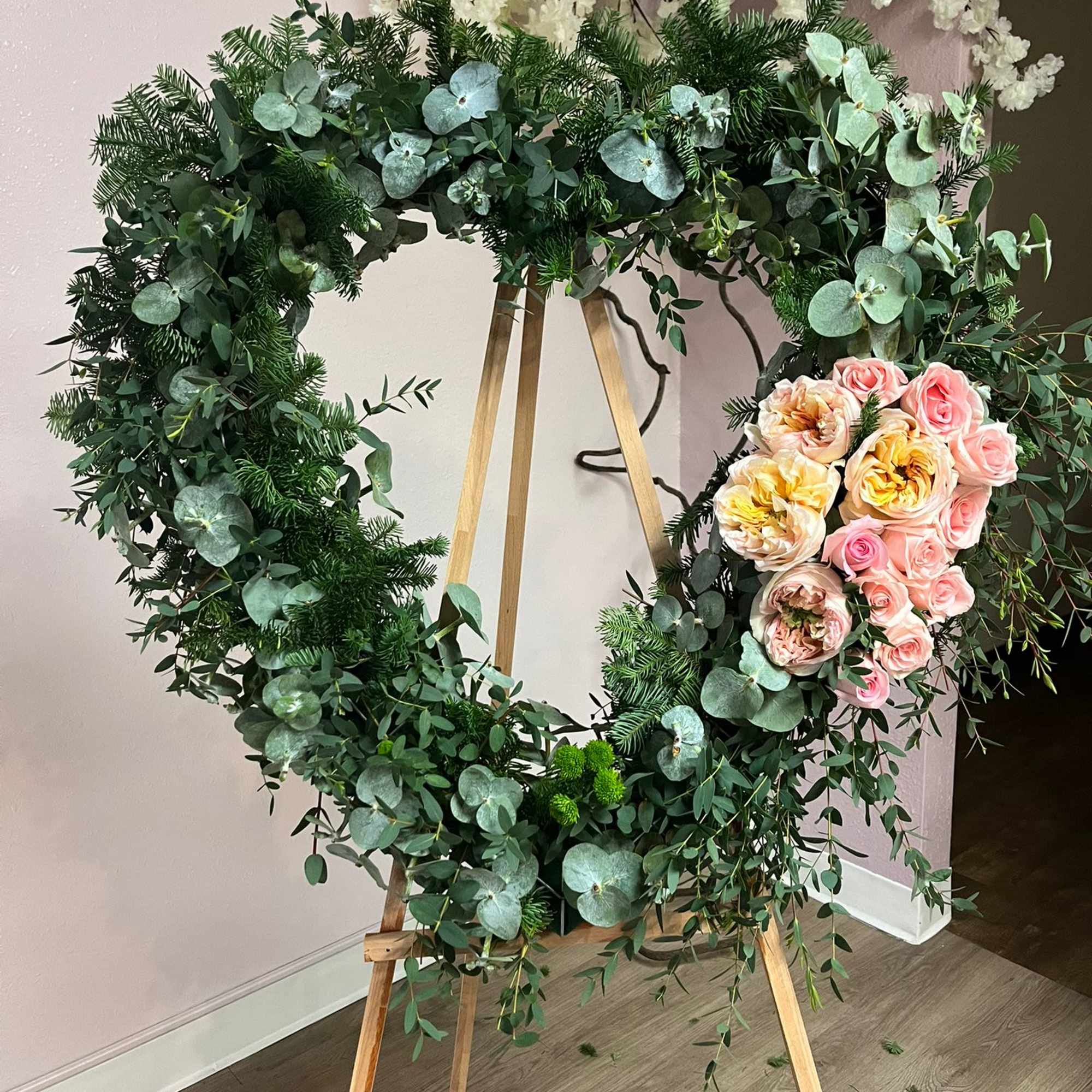 &quot;A funeral heart of Garden Roses, carefully designed to convey elegance and